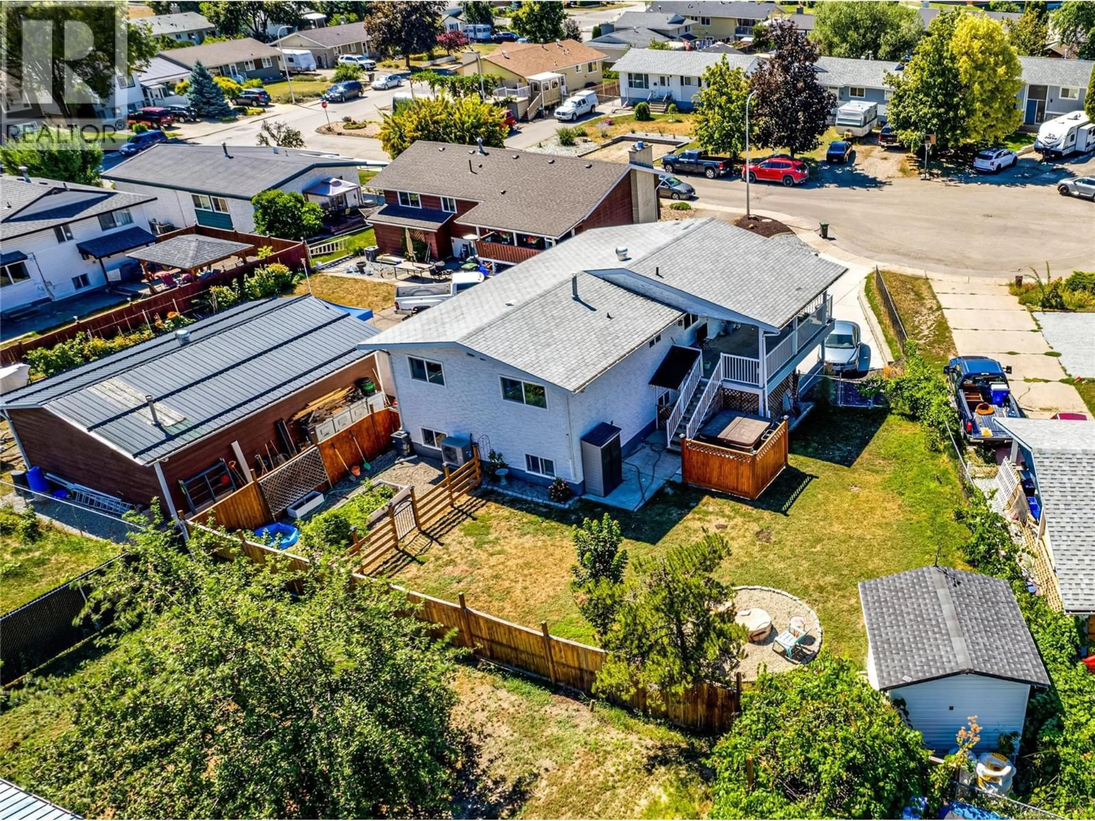 A pic from outside/outdoor area/front of a property/back of a property/a pic from drone, street for 2105 14 STREET, Vernon British Columbia V1T3T8