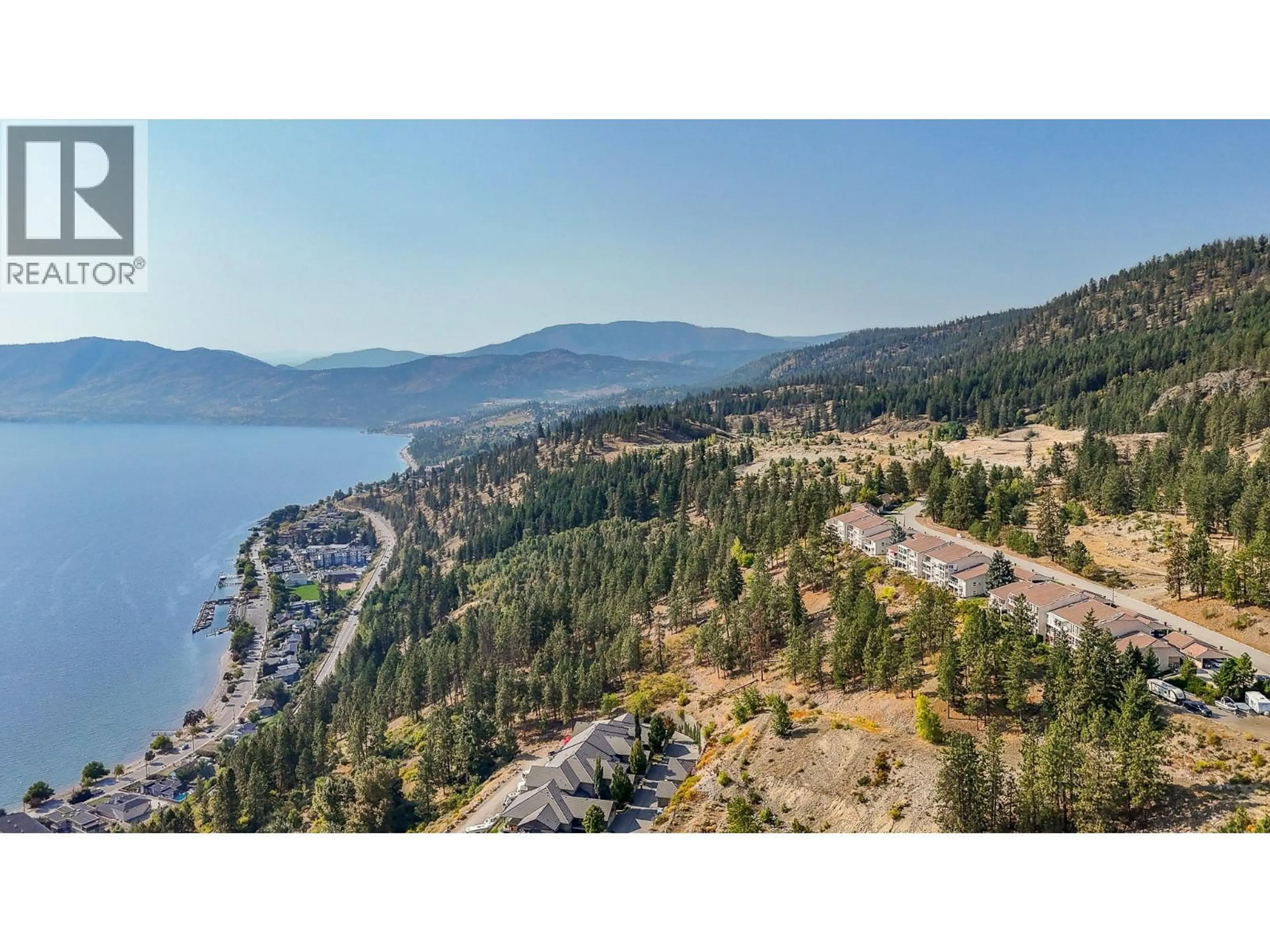 A pic from outside/outdoor area/front of a property/back of a property/a pic from drone, water/lake/river/ocean view for 105 - 4450 PONDEROSA DRIVE, Peachland British Columbia V0H1X5