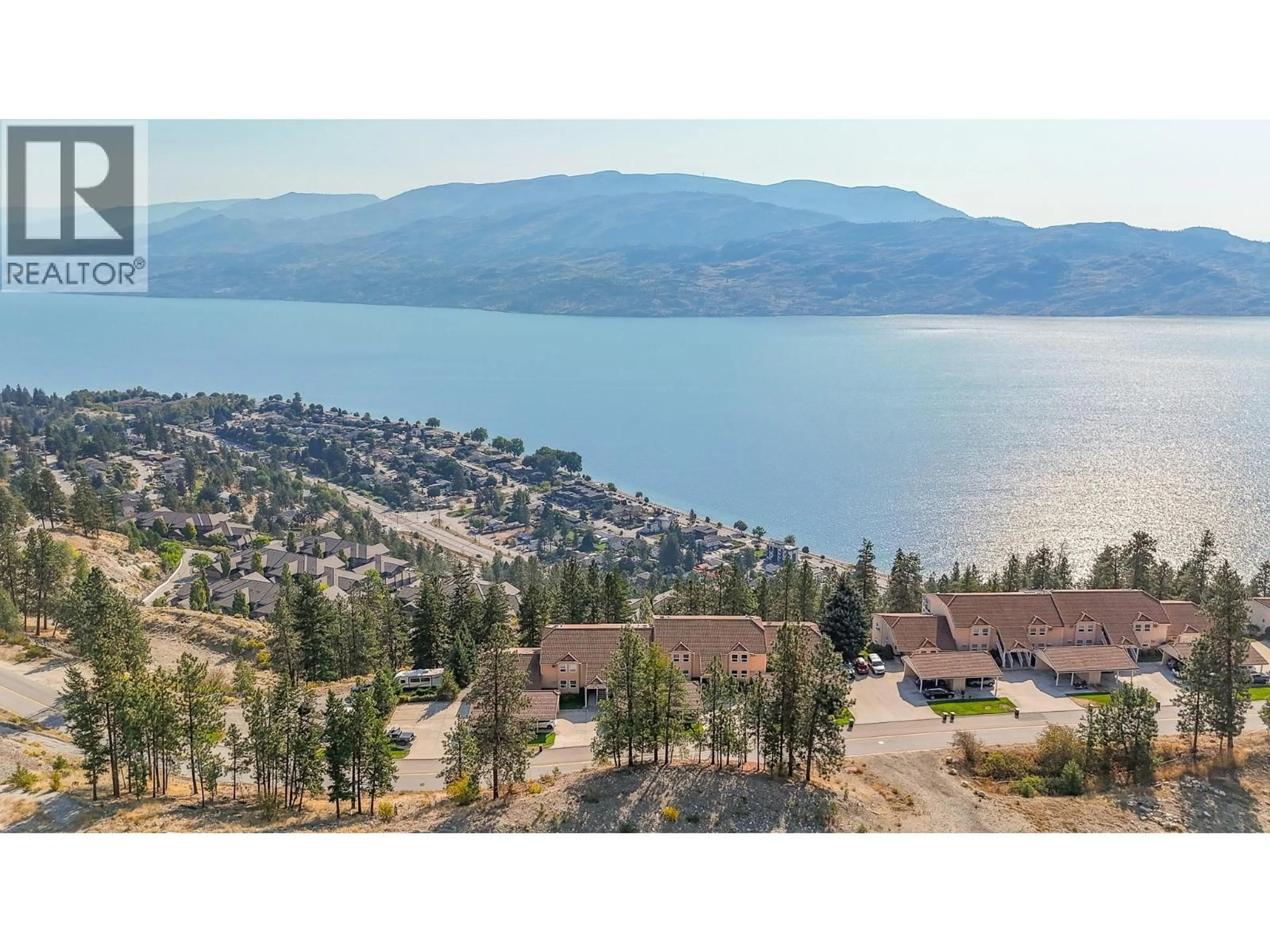 A pic from outside/outdoor area/front of a property/back of a property/a pic from drone, water/lake/river/ocean view for 105 - 4450 PONDEROSA DRIVE, Peachland British Columbia V0H1X5