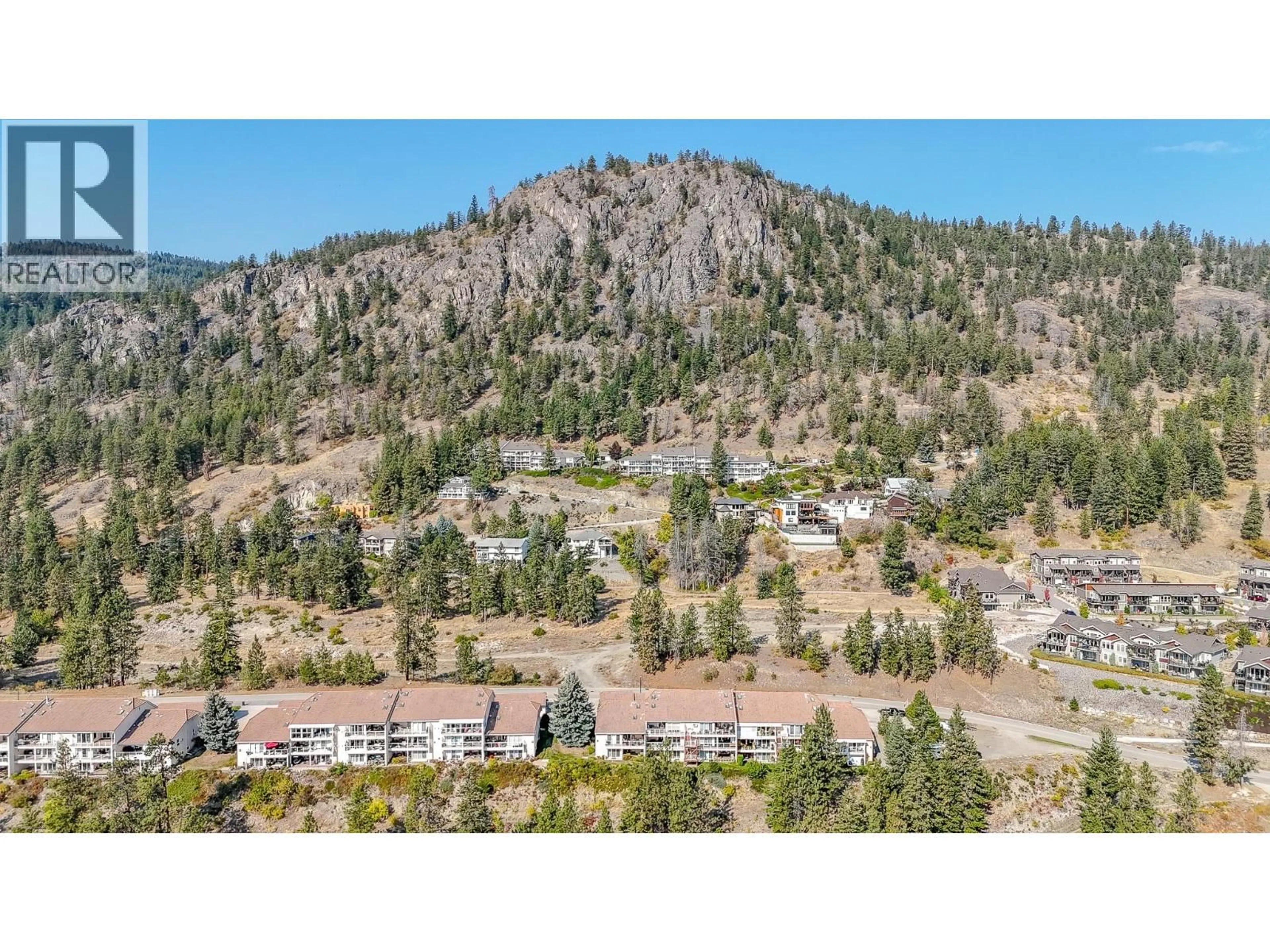 A pic from outside/outdoor area/front of a property/back of a property/a pic from drone, mountain view for 105 - 4450 PONDEROSA DRIVE, Peachland British Columbia V0H1X5