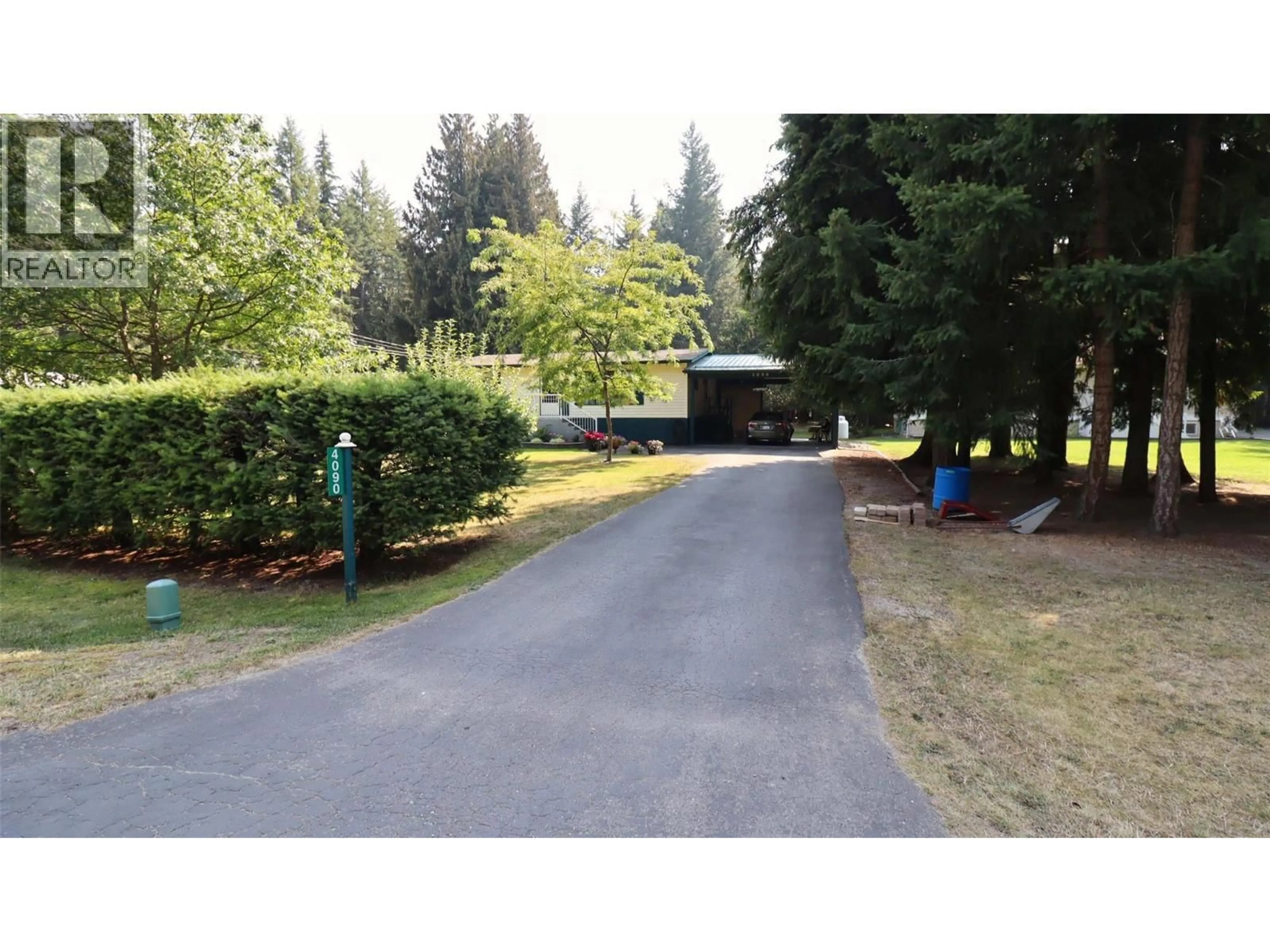 A pic from outside/outdoor area/front of a property/back of a property/a pic from drone, street for 4090 BUTTERS ROAD, Scotch Creek British Columbia V0E1M5
