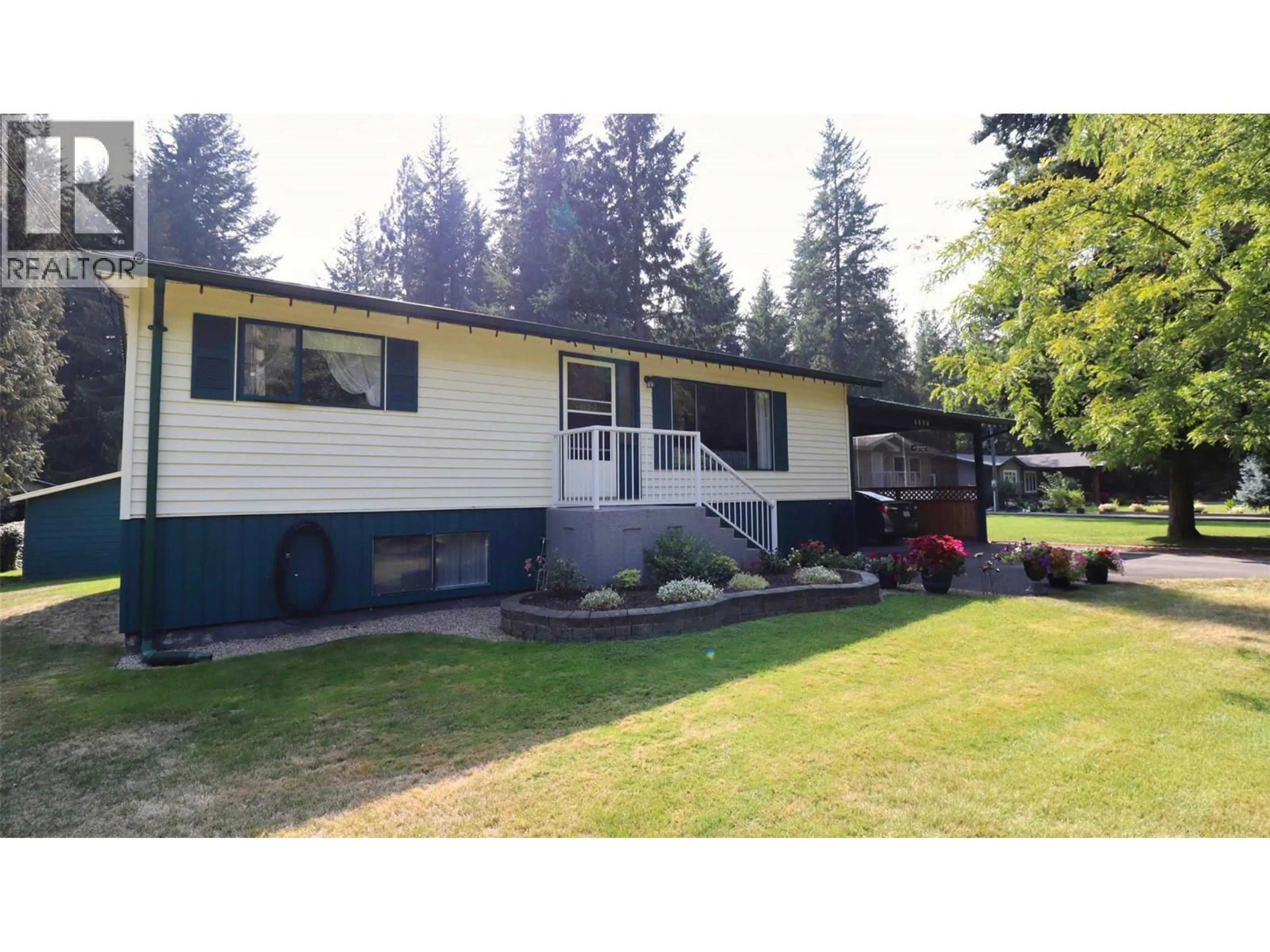 Home with vinyl exterior material, street for 4090 BUTTERS ROAD, Scotch Creek British Columbia V0E1M5