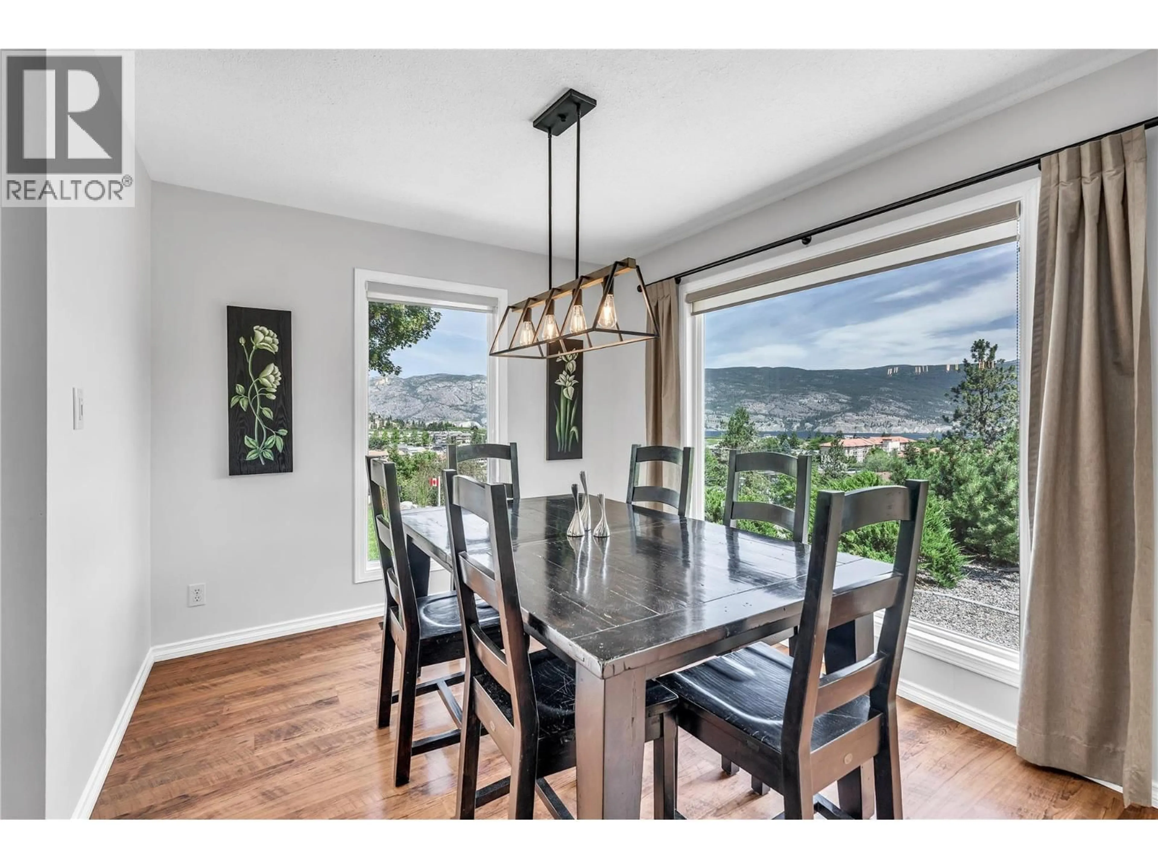 Dining room, wood/laminate floor for 8704 KURODA PLACE, Summerland British Columbia V0H1Z7