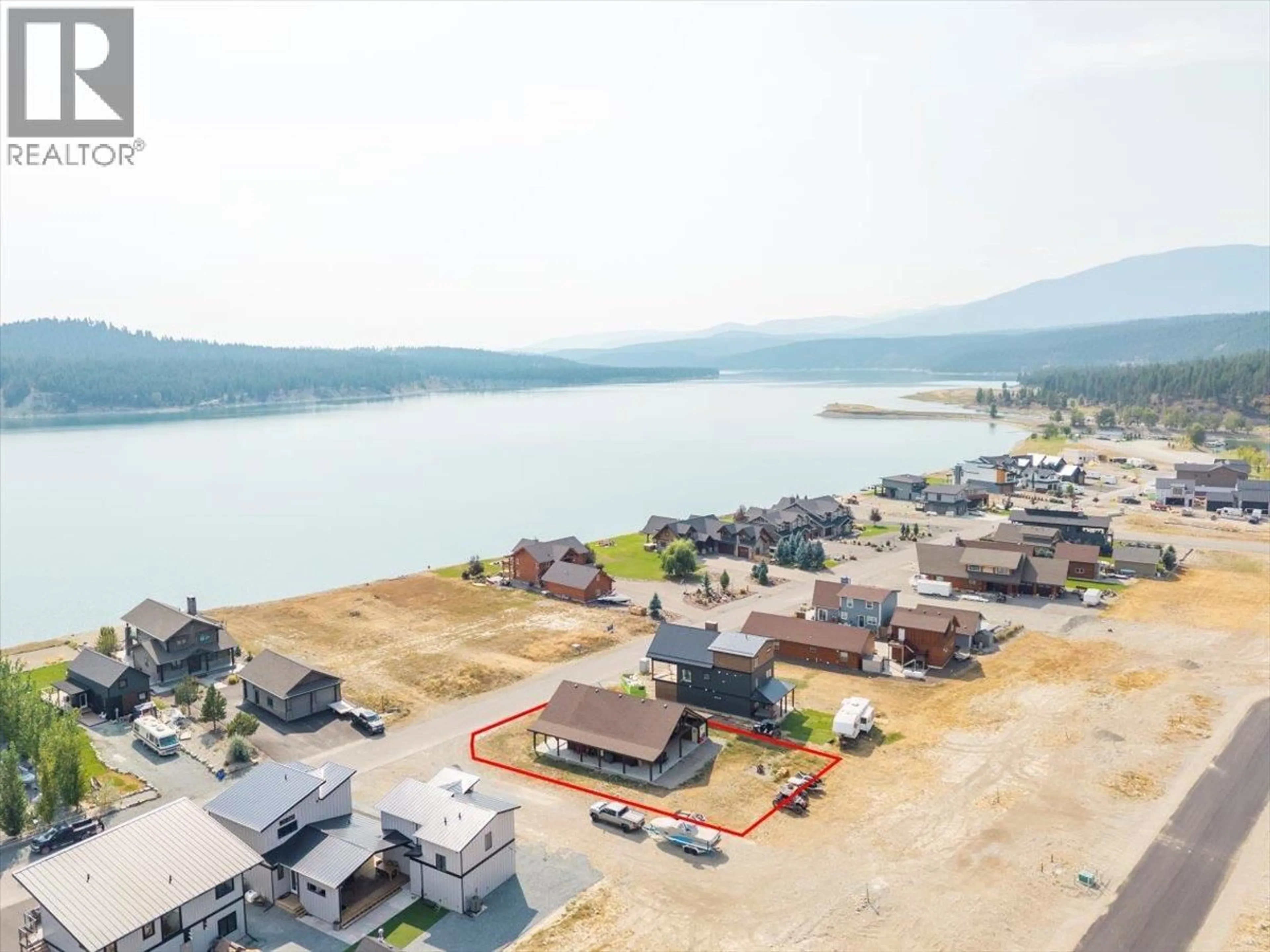 A pic from outside/outdoor area/front of a property/back of a property/a pic from drone, water/lake/river/ocean view for 1705 KOOCANUSA LAKE DRIVE, Lake Koocanusa British Columbia V0B1T5