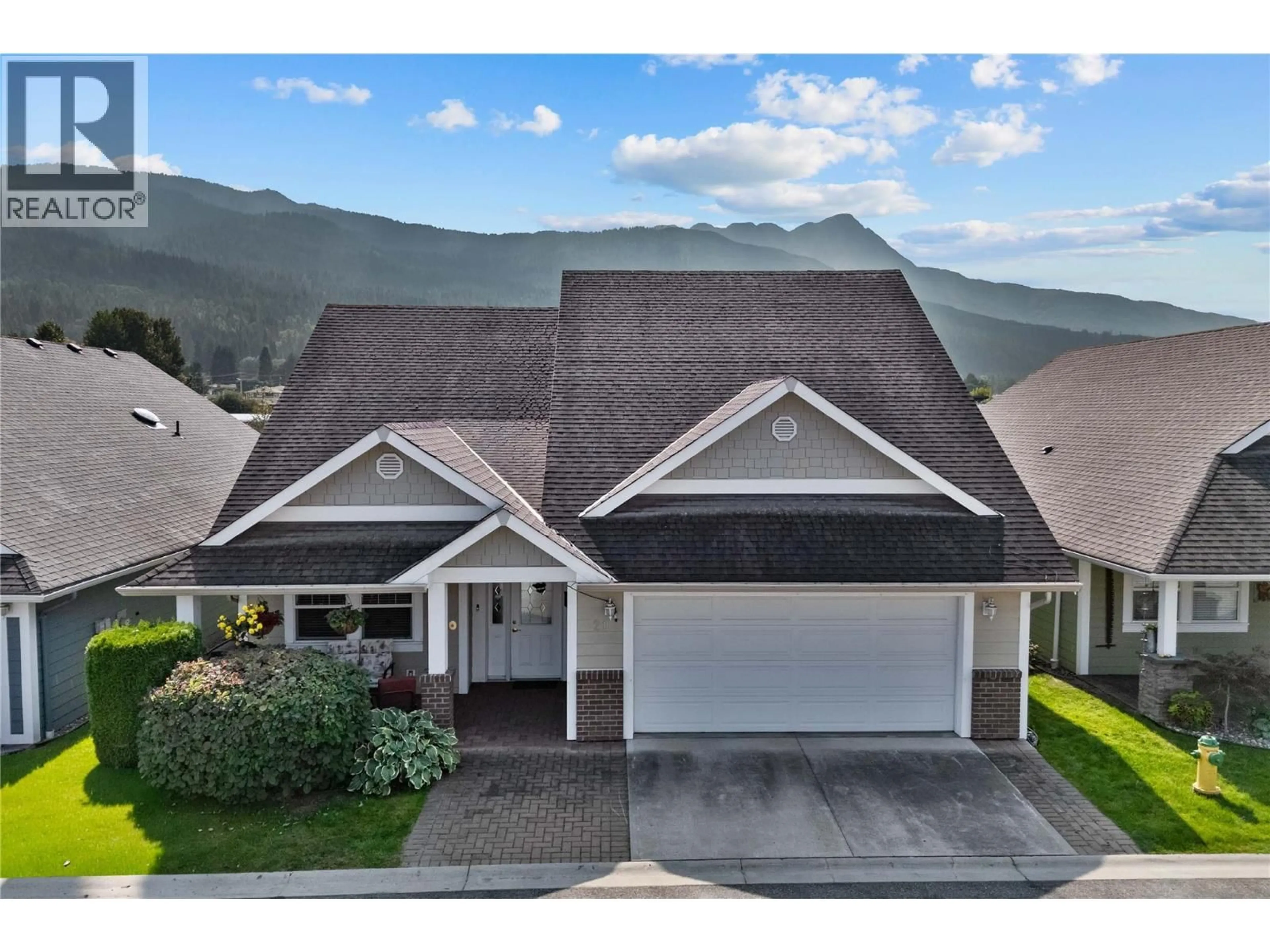 Home with vinyl exterior material, mountain view for 21 - 1231 10TH STREET SOUTHWEST, Salmon Arm British Columbia V1E0A5