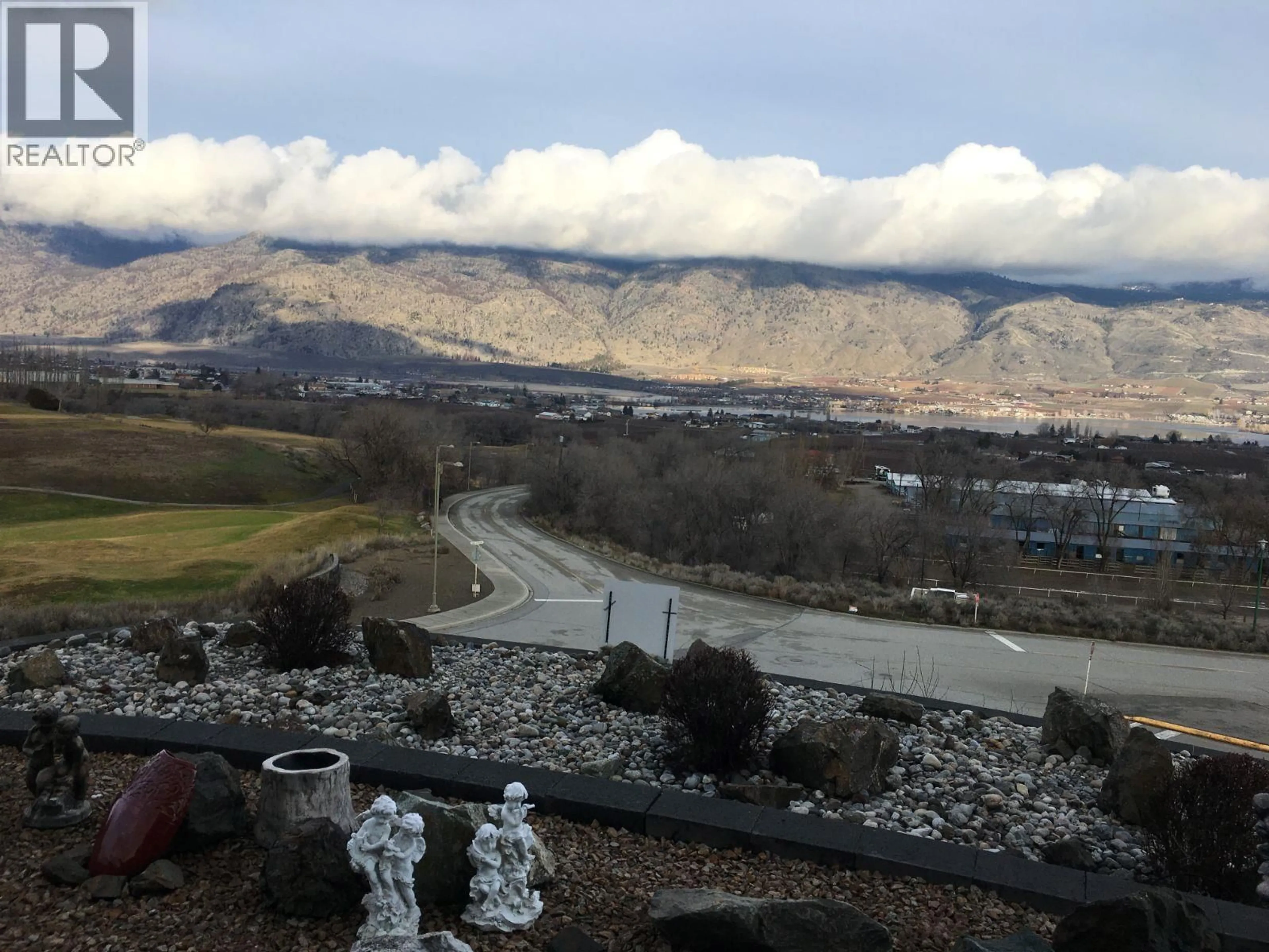 A pic from outside/outdoor area/front of a property/back of a property/a pic from drone, mountain view for 11701 QUAIL RIDGE PLACE, Osoyoos British Columbia V0H1V4