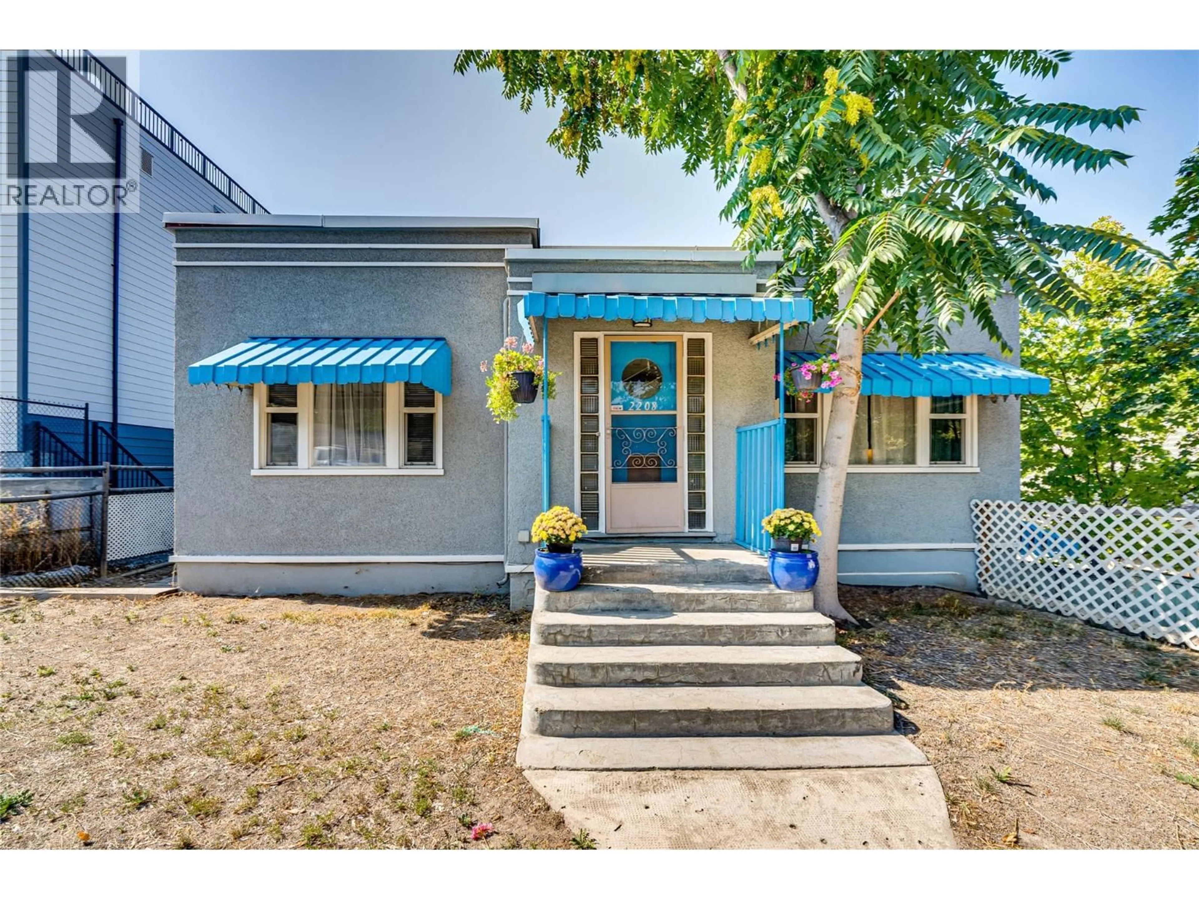 Home with vinyl exterior material, street for 2208 32 STREET, Vernon British Columbia V1T5L3