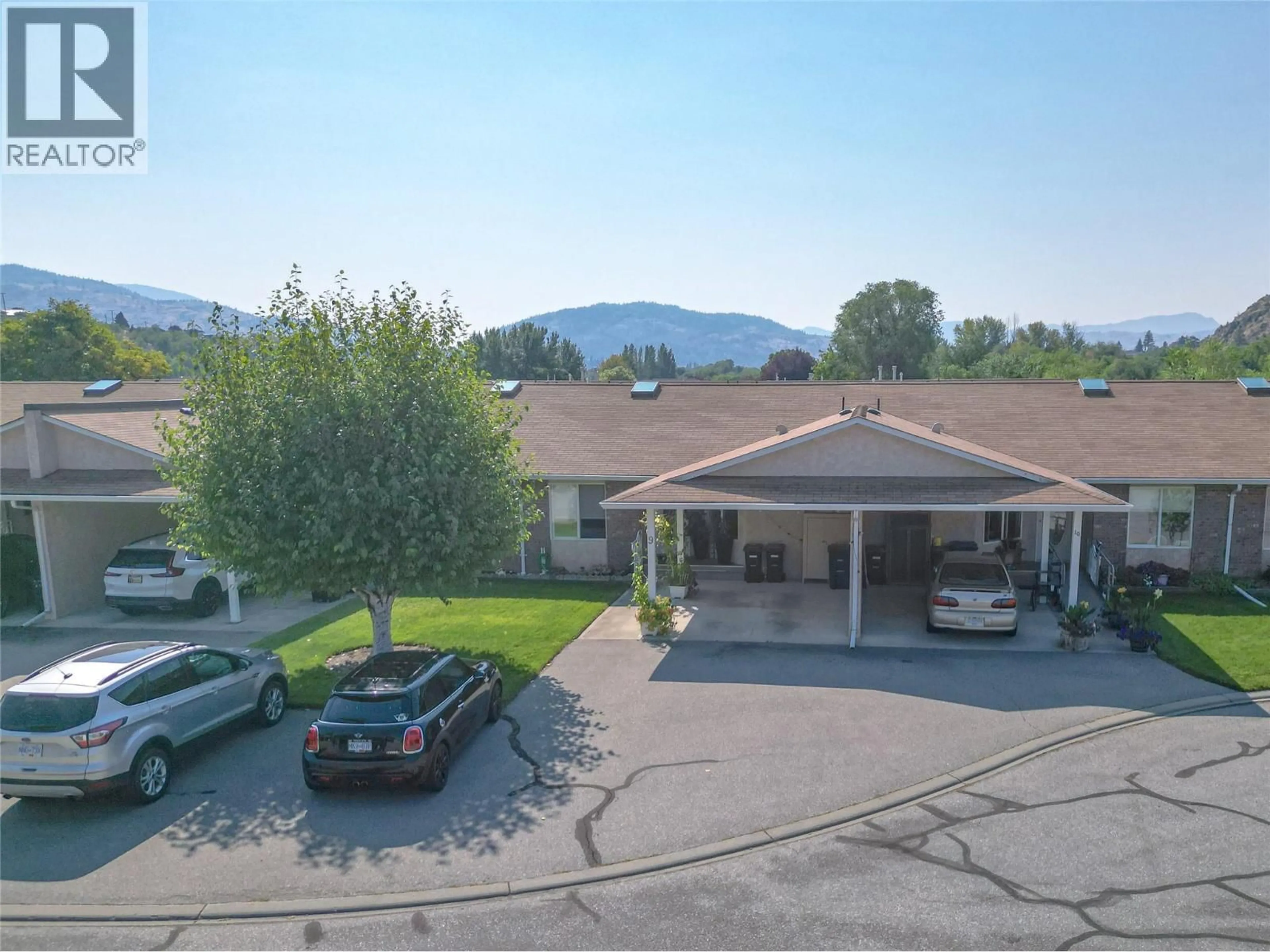 A pic from outside/outdoor area/front of a property/back of a property/a pic from drone, mountain view for 9 - 115 REDWING PLACE, Oliver British Columbia V0H1T4