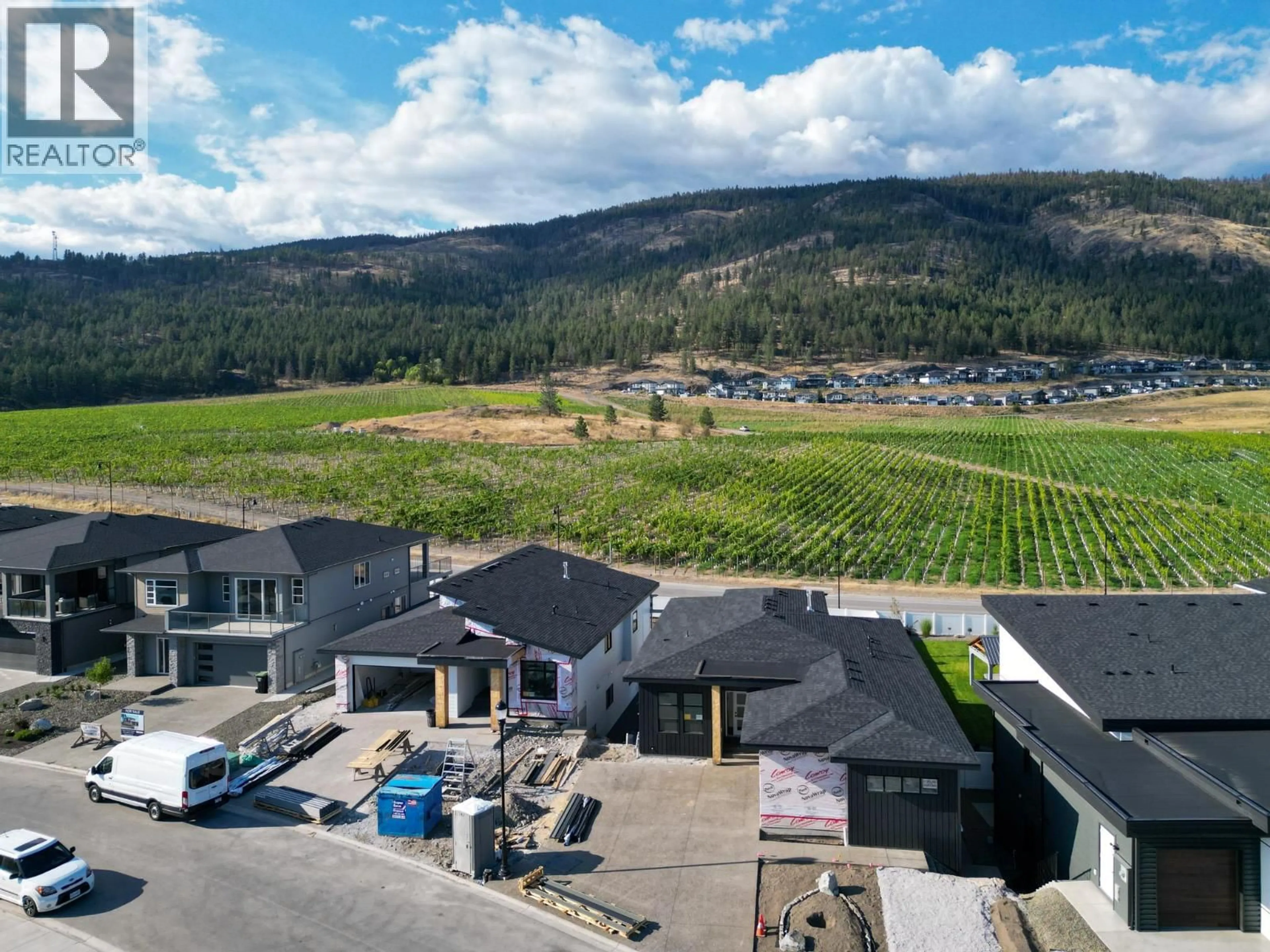 A pic from outside/outdoor area/front of a property/back of a property/a pic from drone, mountain view for 2540 PINNACLE RIDGE DRIVE, West Kelowna British Columbia V4T0G4