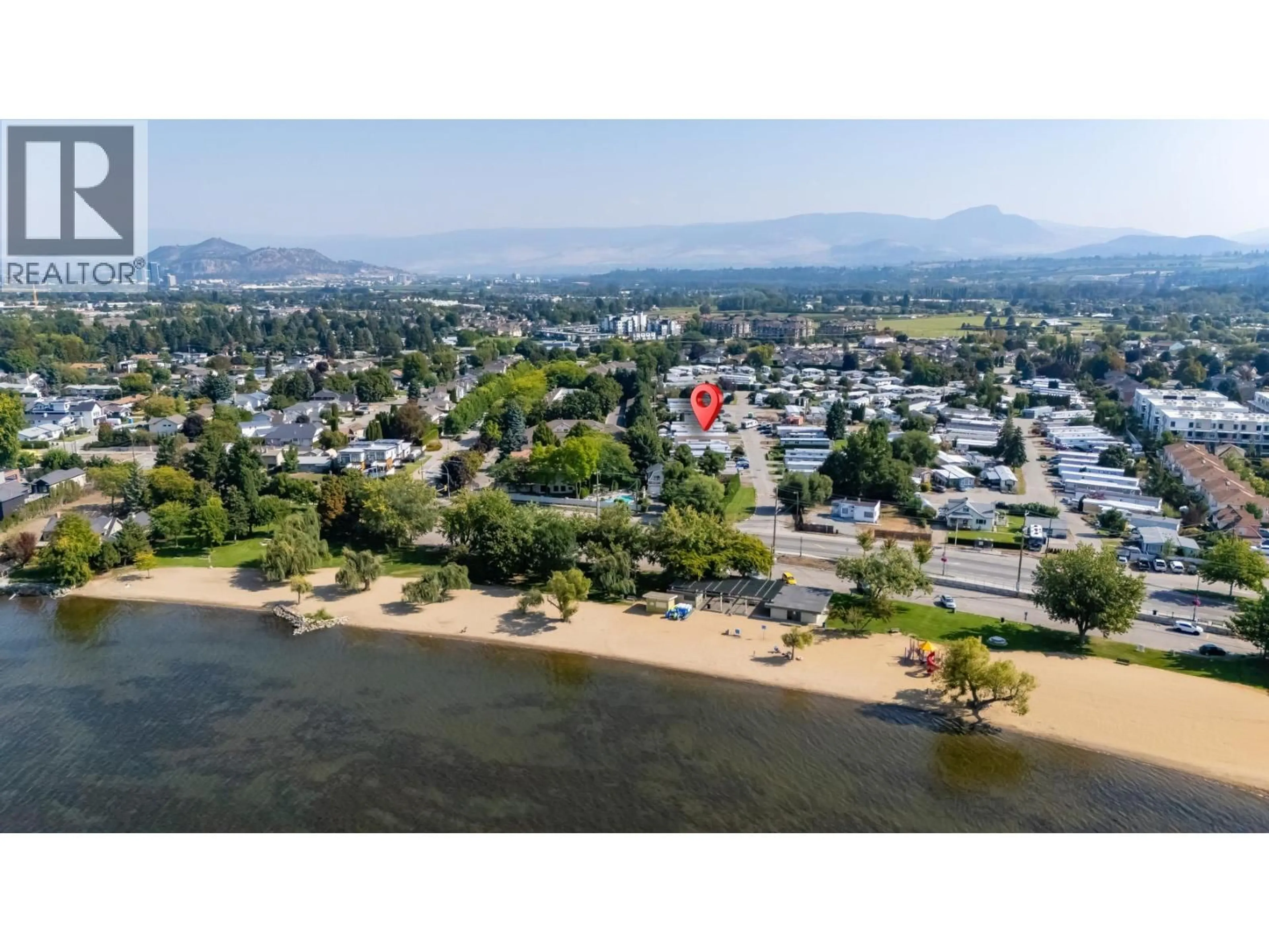 A pic from outside/outdoor area/front of a property/back of a property/a pic from drone, water/lake/river/ocean view for 8 - 3745 LAKESHORE ROAD, Kelowna British Columbia V1W3K4
