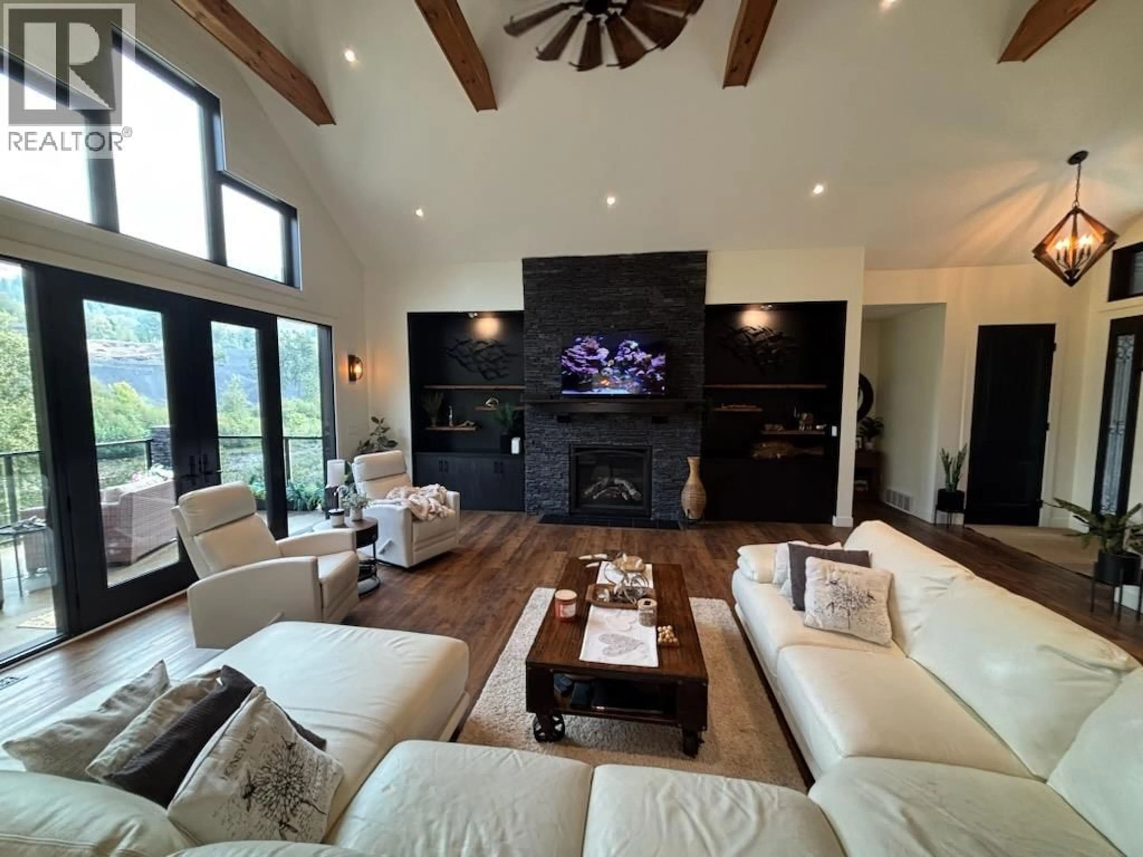 Living room with furniture, unknown for 8660 RIVERSIDE DRIVE, Grand Forks British Columbia V0H1H0
