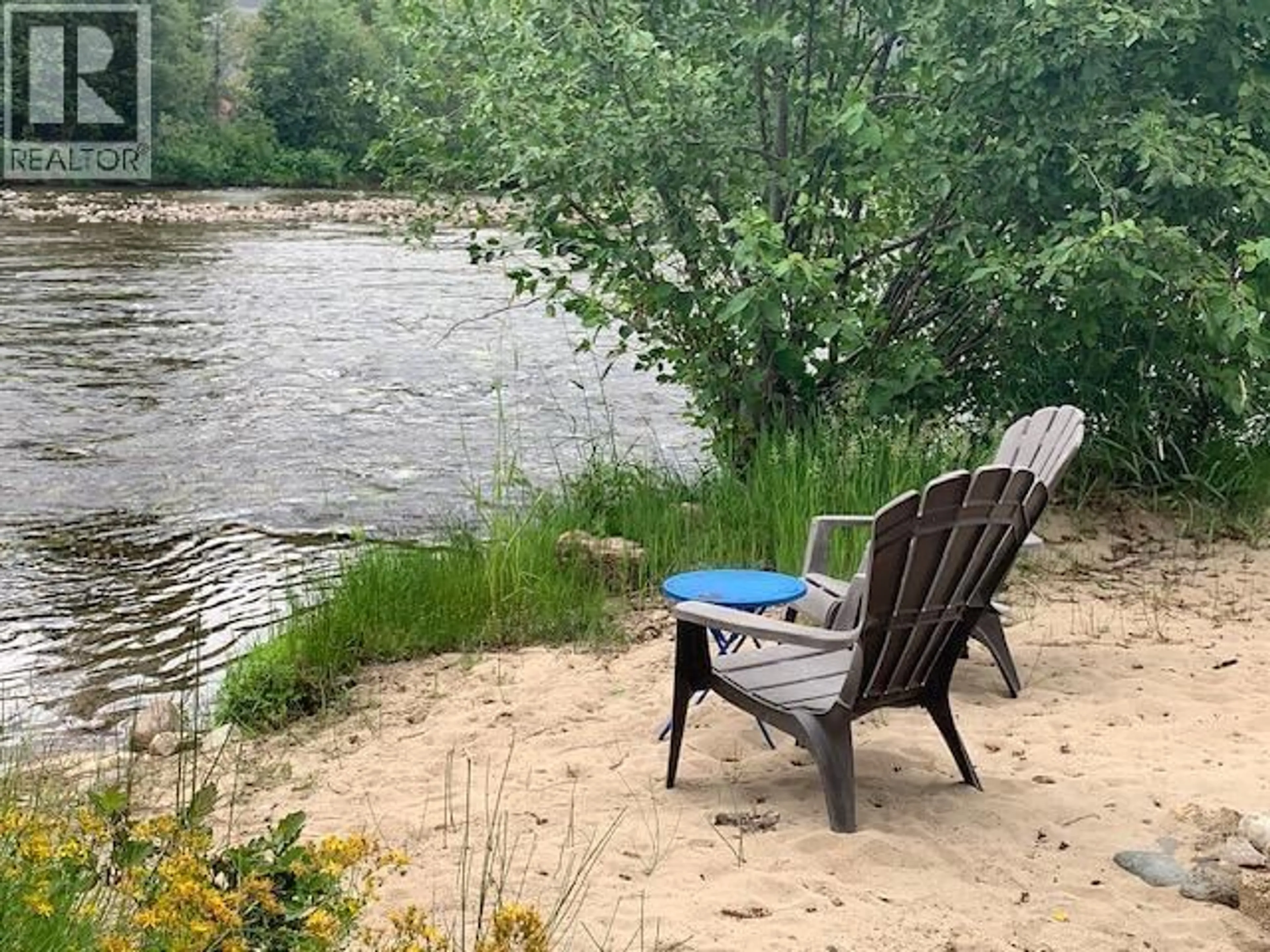 Patio, water/lake/river/ocean view for 8660 RIVERSIDE DRIVE, Grand Forks British Columbia V0H1H0