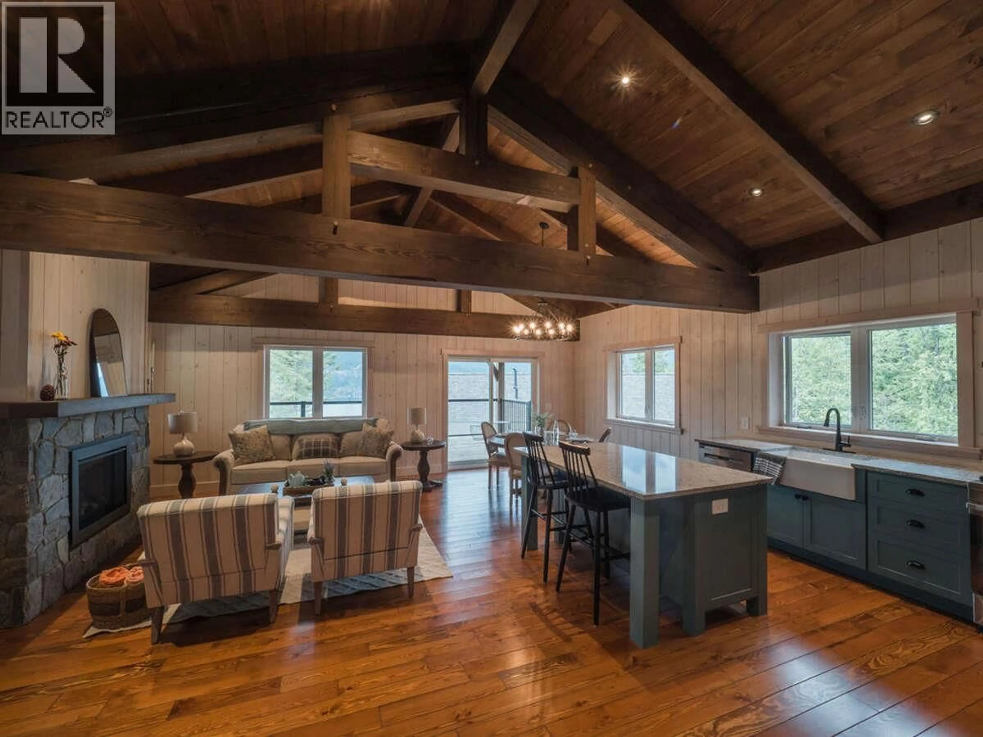Open concept kitchen, wood/laminate floor for 23 BIRCHGROVE BEND, Kaslo British Columbia V0G1M0