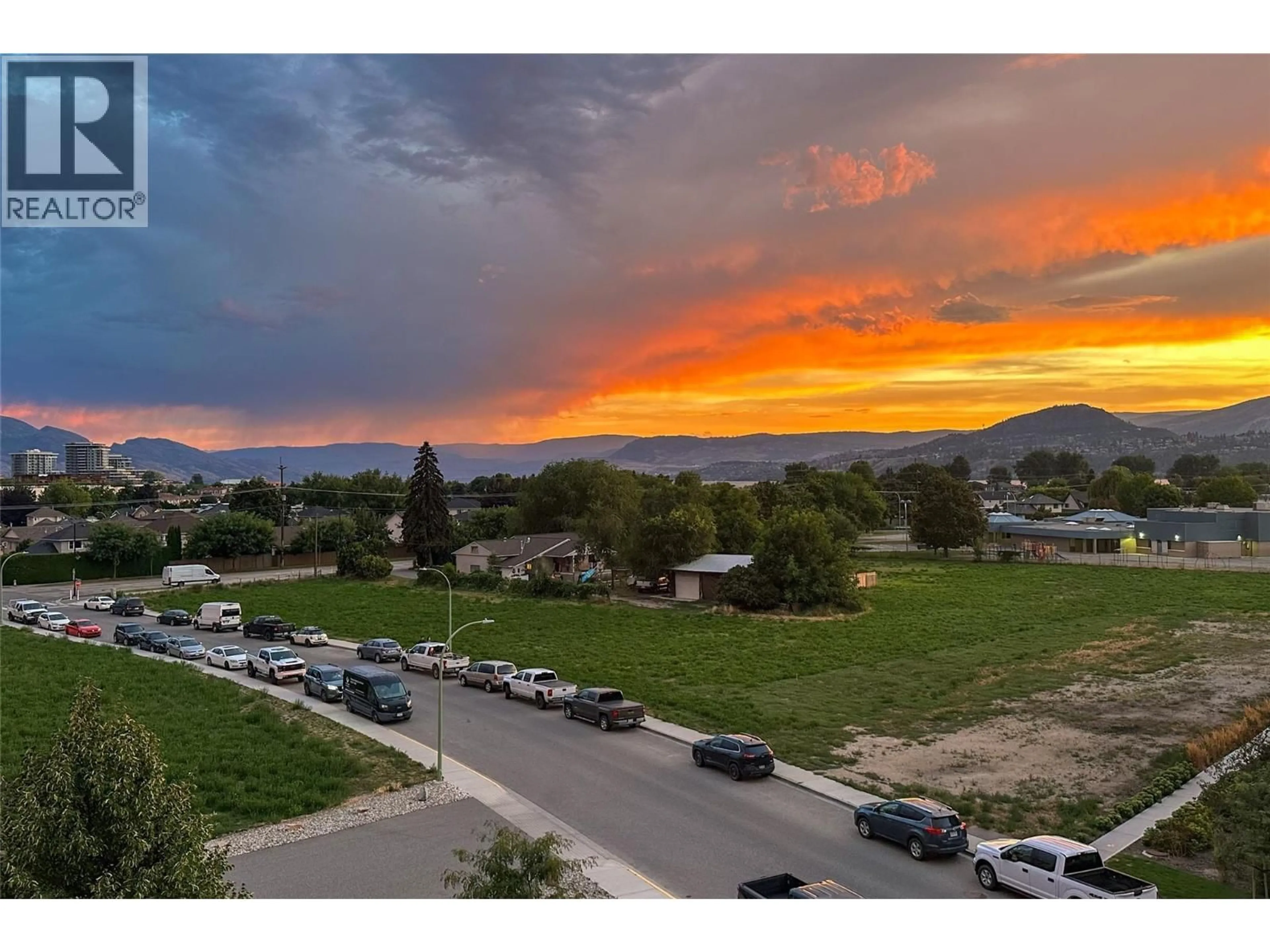A pic from outside/outdoor area/front of a property/back of a property/a pic from drone, mountain view for 407 - 3733 CASORSO ROAD, Kelowna British Columbia V1W5E3