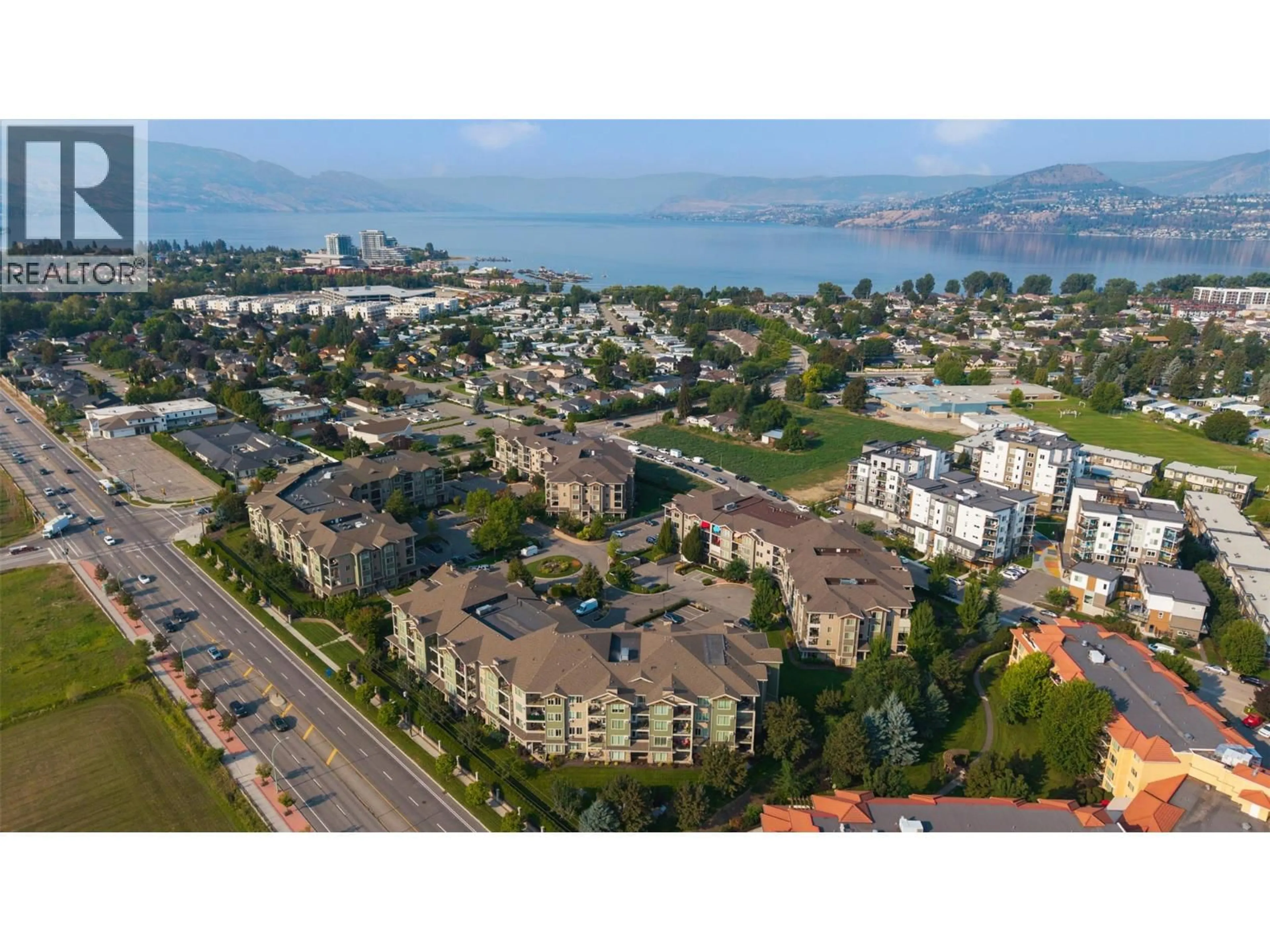 A pic from outside/outdoor area/front of a property/back of a property/a pic from drone, mountain view for 407 - 3733 CASORSO ROAD, Kelowna British Columbia V1W5E3