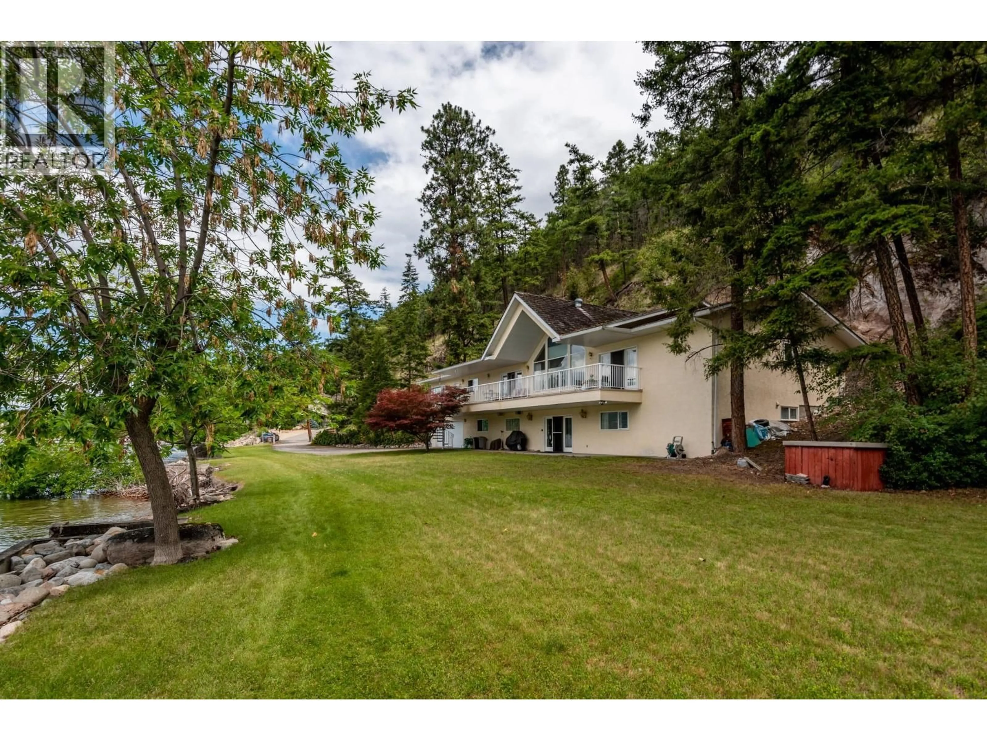 A pic from outside/outdoor area/front of a property/back of a property/a pic from drone, unknown for 13 - 9990 EASTSIDE ROAD, Vernon British Columbia V1H1V1