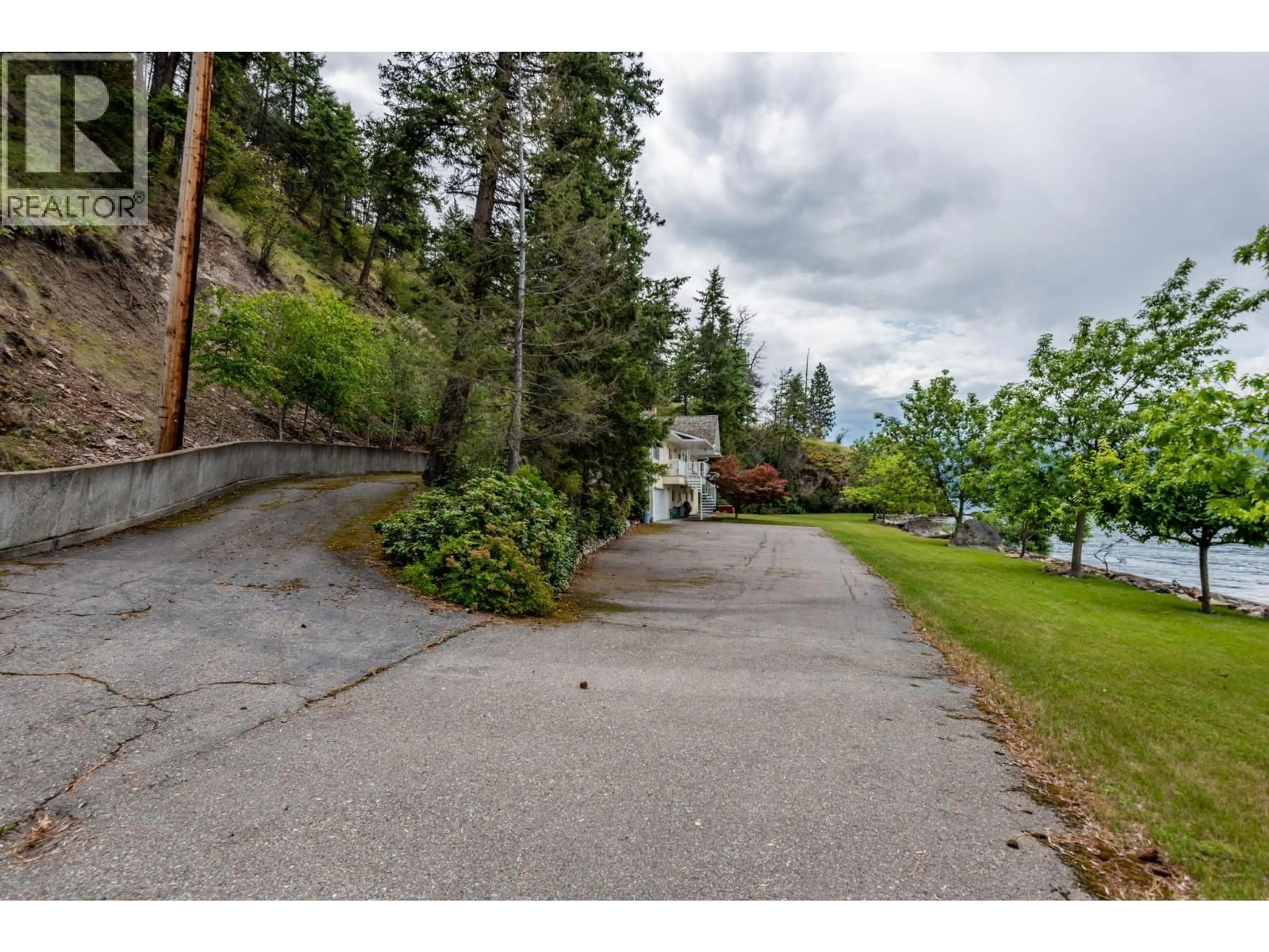 A pic from outside/outdoor area/front of a property/back of a property/a pic from drone, unknown for 13 - 9990 EASTSIDE ROAD, Vernon British Columbia V1H1V1