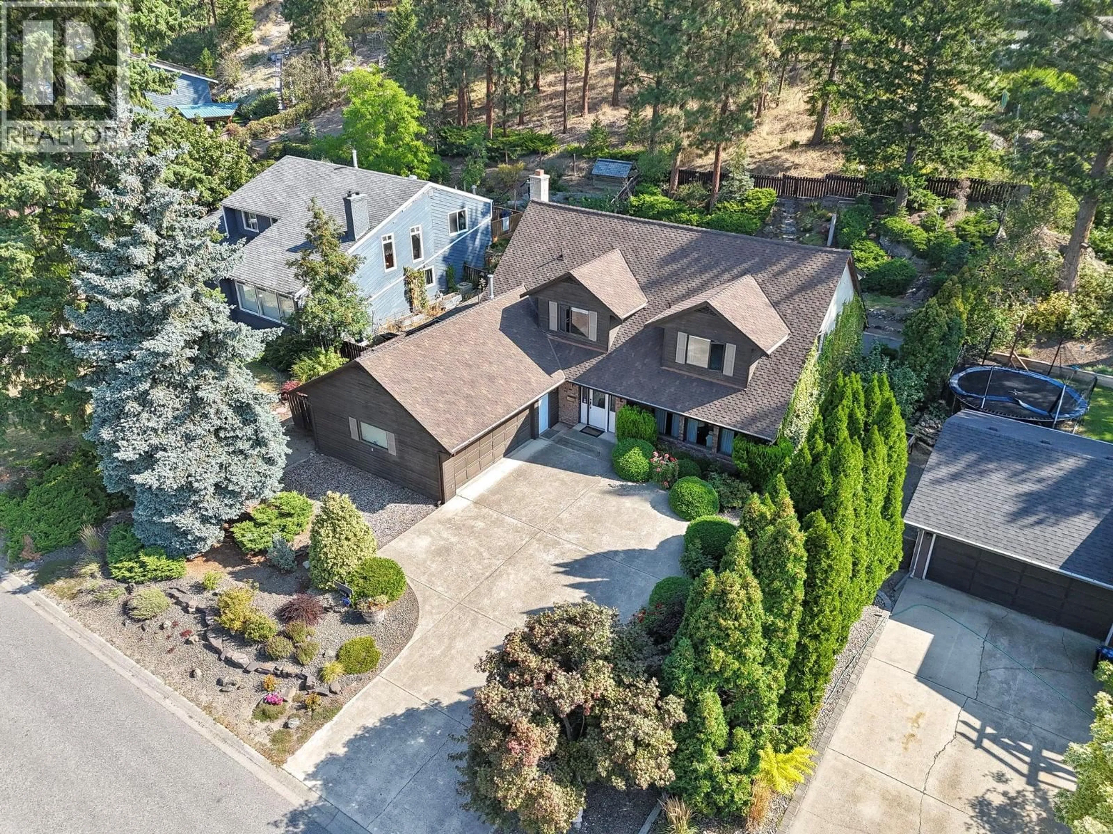 A pic from outside/outdoor area/front of a property/back of a property/a pic from drone, street for 3179 WOODSTOCK DRIVE, West Kelowna British Columbia V4T1S2