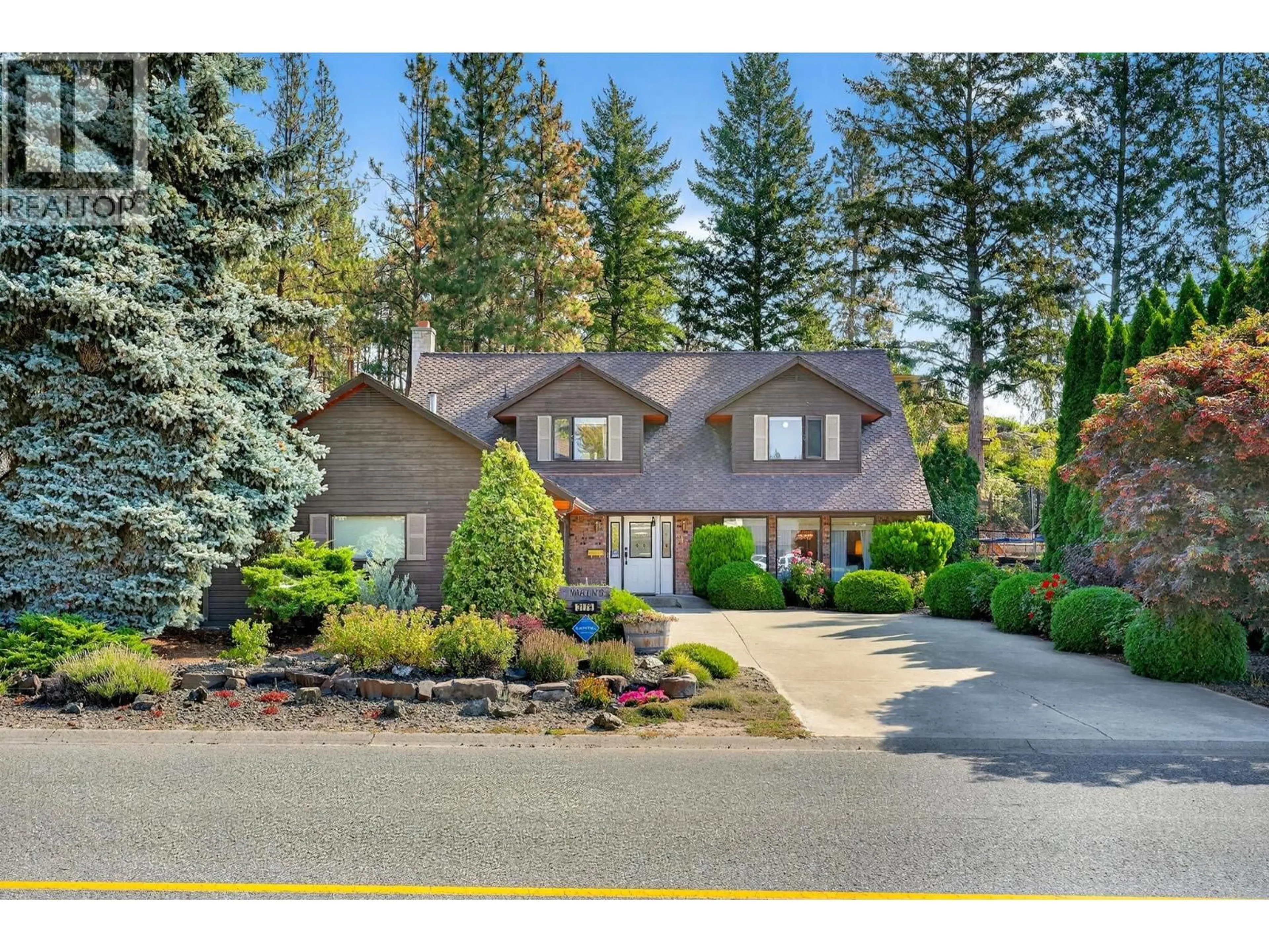 Home with vinyl exterior material, street for 3179 WOODSTOCK DRIVE, West Kelowna British Columbia V4T1S2
