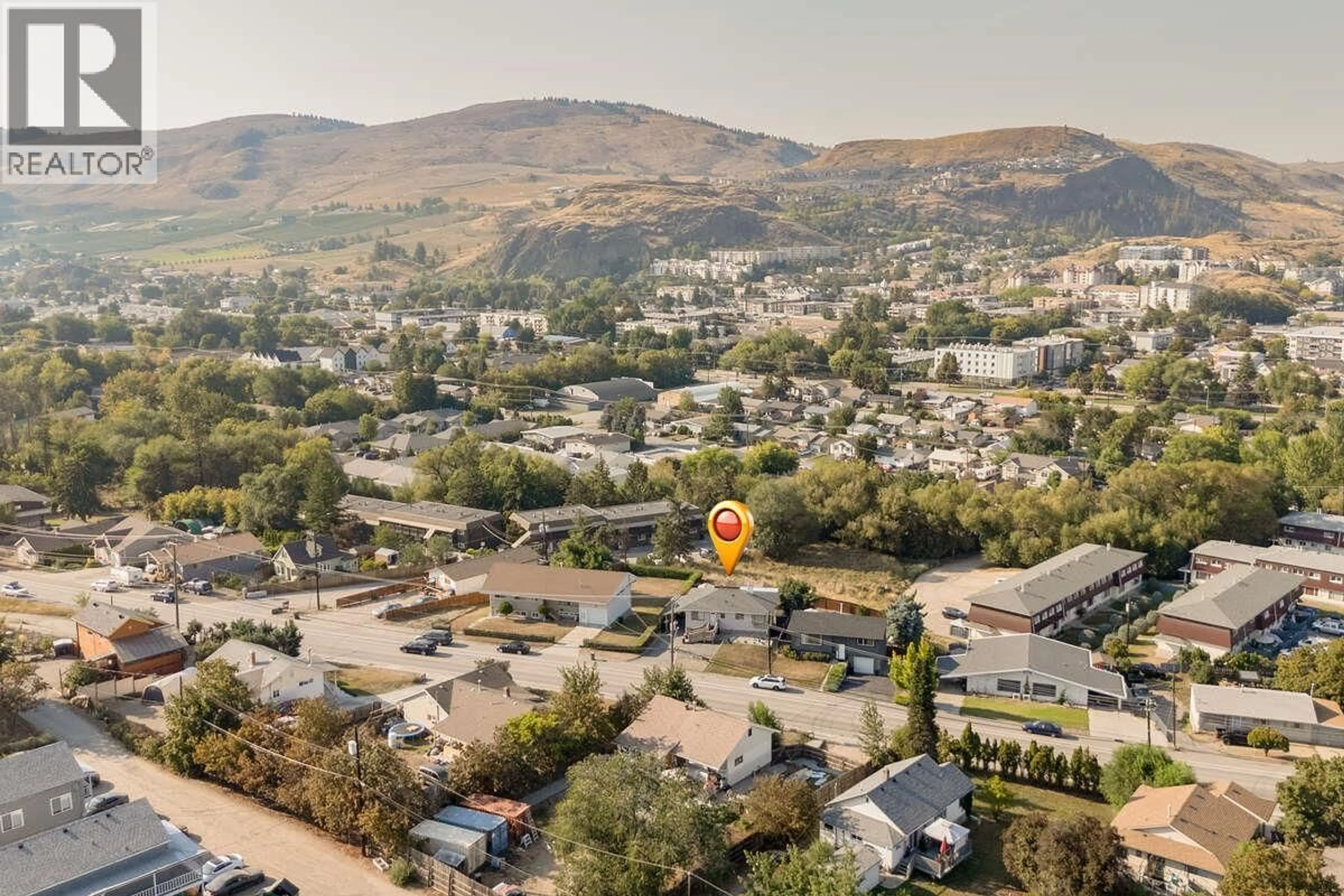 A pic from outside/outdoor area/front of a property/back of a property/a pic from drone, mountain view for 3409 OKANAGAN AVENUE, Vernon British Columbia V1T1K5