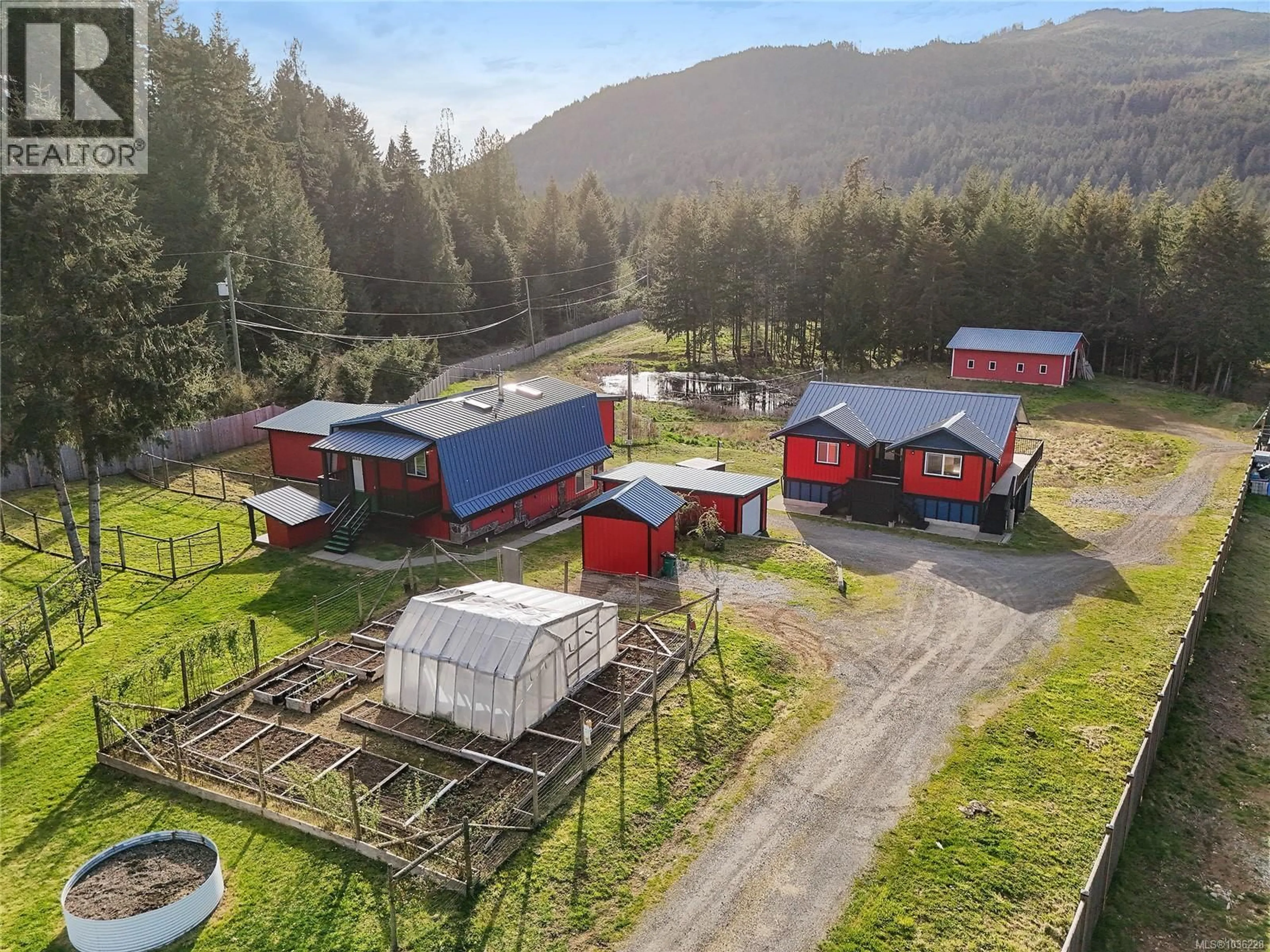 A pic from outside/outdoor area/front of a property/back of a property/a pic from drone, mountain view for 2945 LAVEROCK ROAD, Shawnigan Lake British Columbia V8H2E4