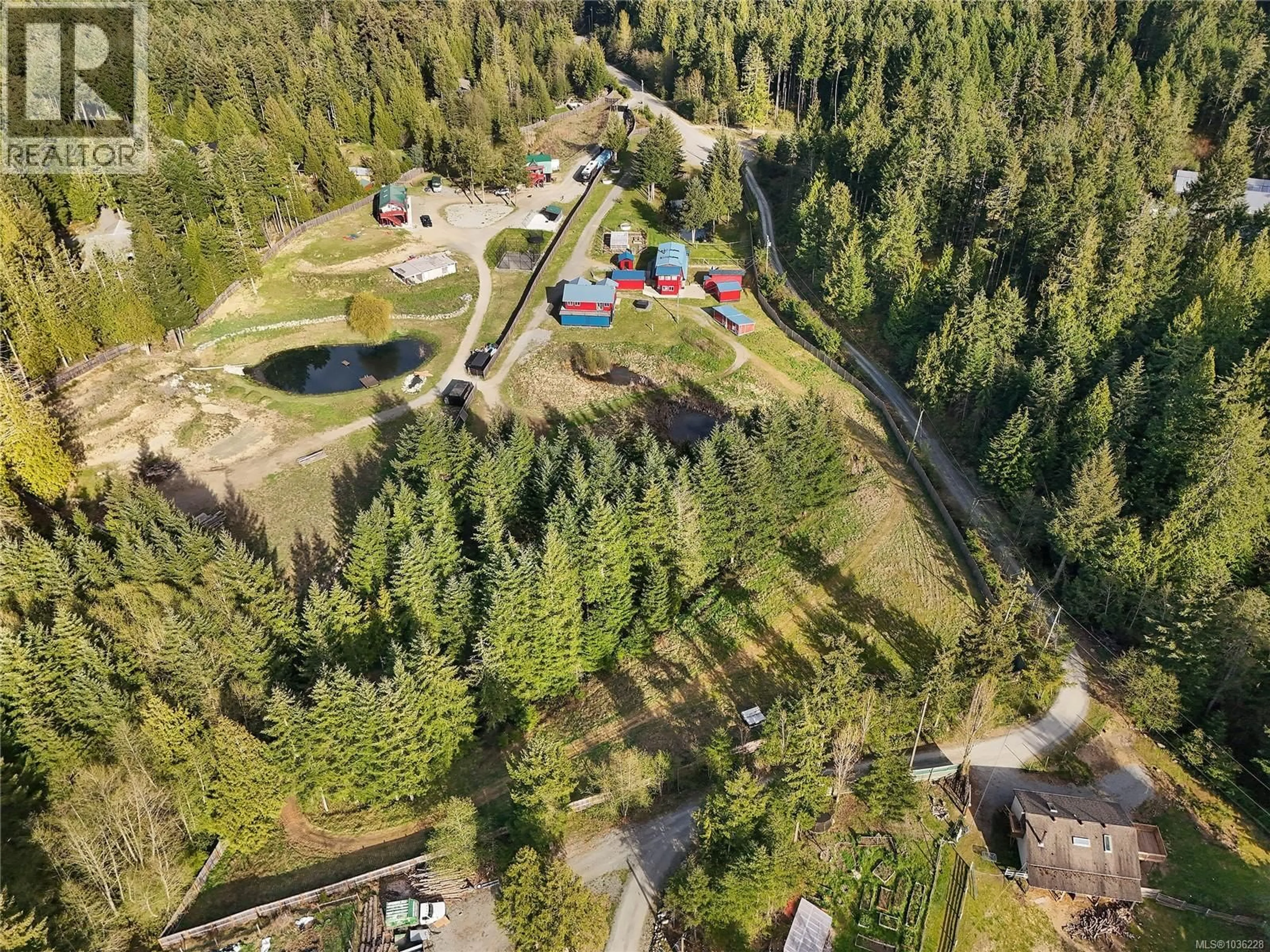 A pic from outside/outdoor area/front of a property/back of a property/a pic from drone, forest/trees view for 2945 LAVEROCK ROAD, Shawnigan Lake British Columbia V8H2E4