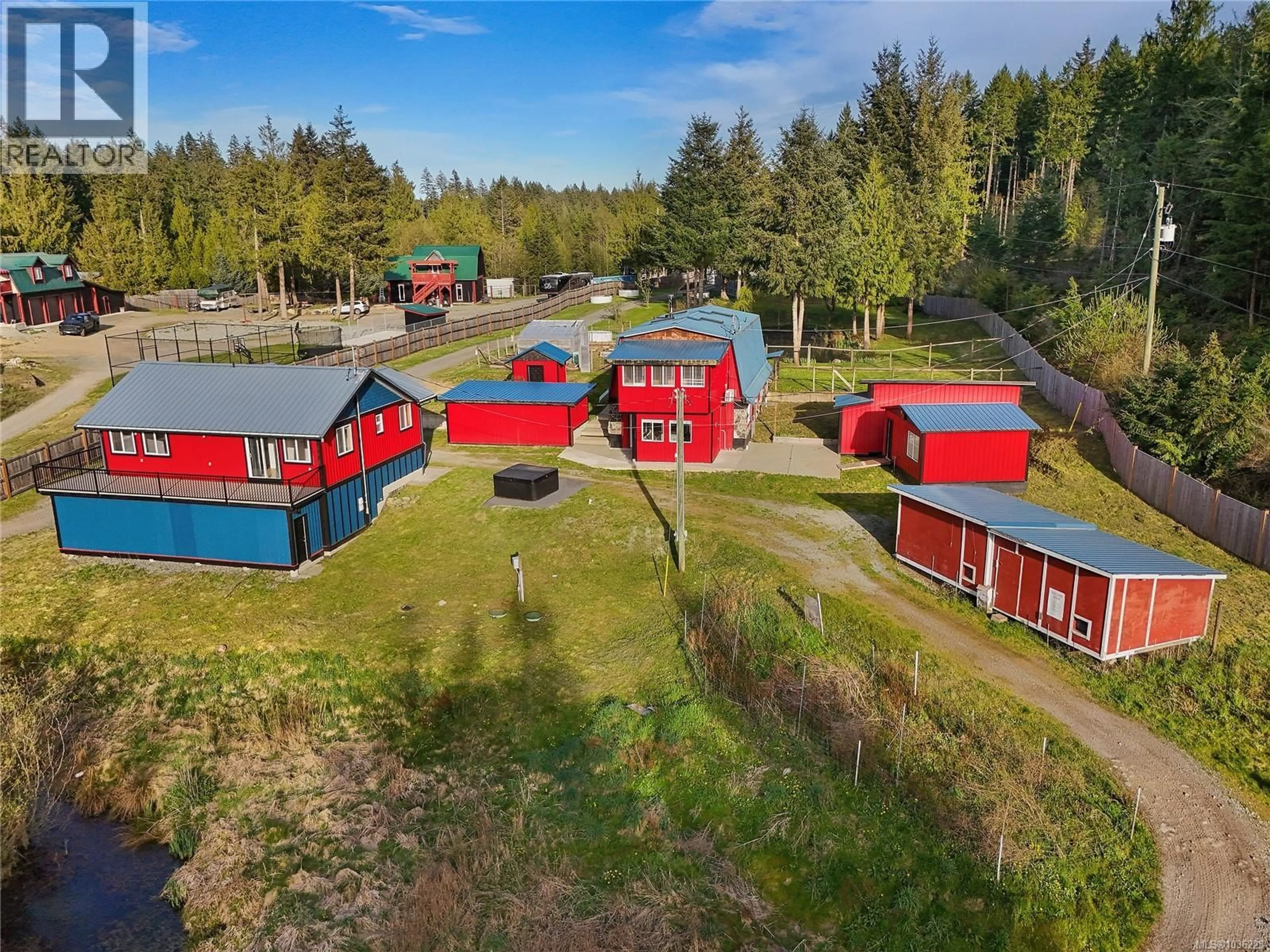 A pic from outside/outdoor area/front of a property/back of a property/a pic from drone, unknown for 2945 LAVEROCK ROAD, Shawnigan Lake British Columbia V8H2E4