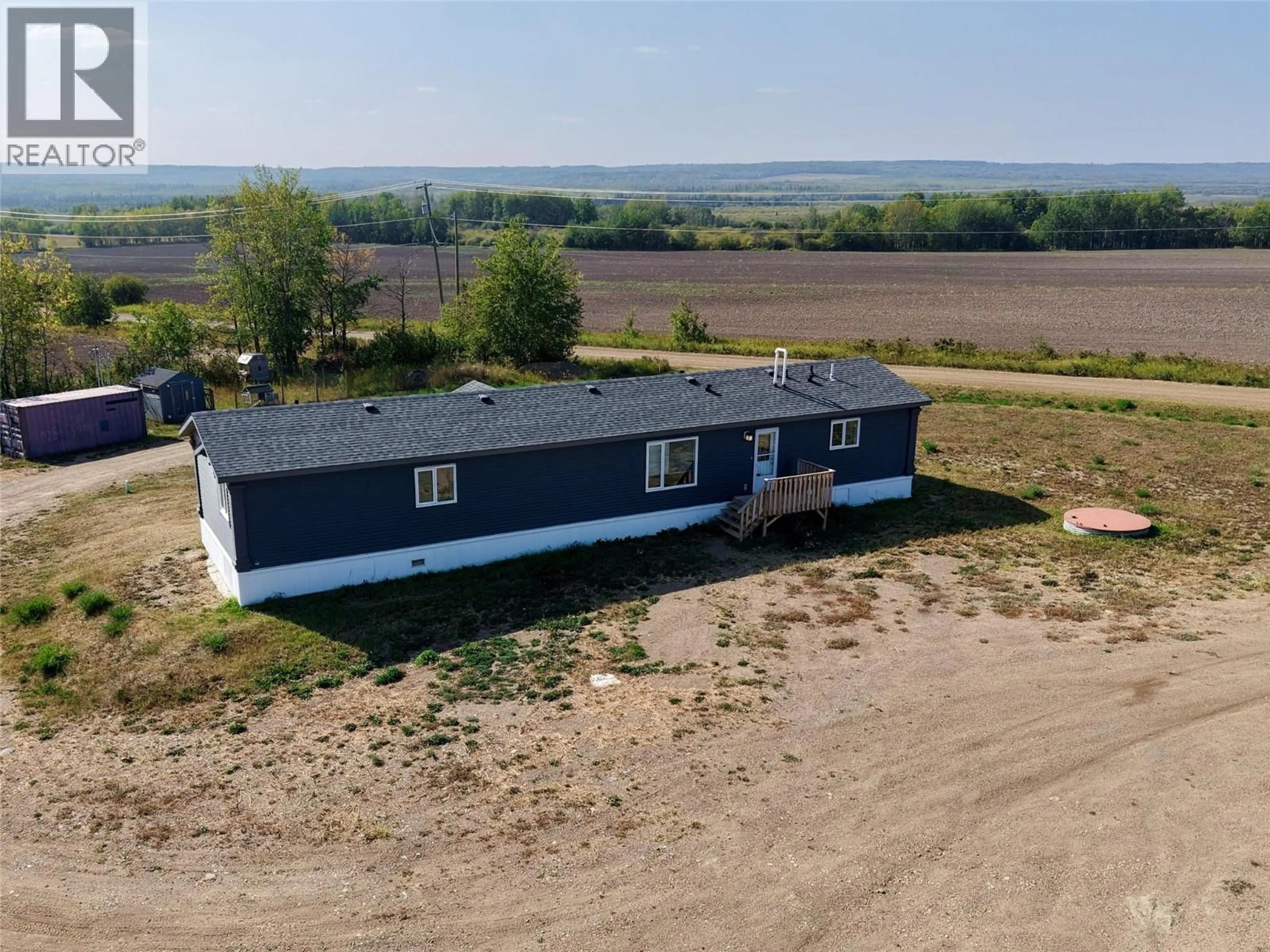 A pic from outside/outdoor area/front of a property/back of a property/a pic from drone, building for 15243 209 ROAD, Dawson Creek British Columbia V0C2L0