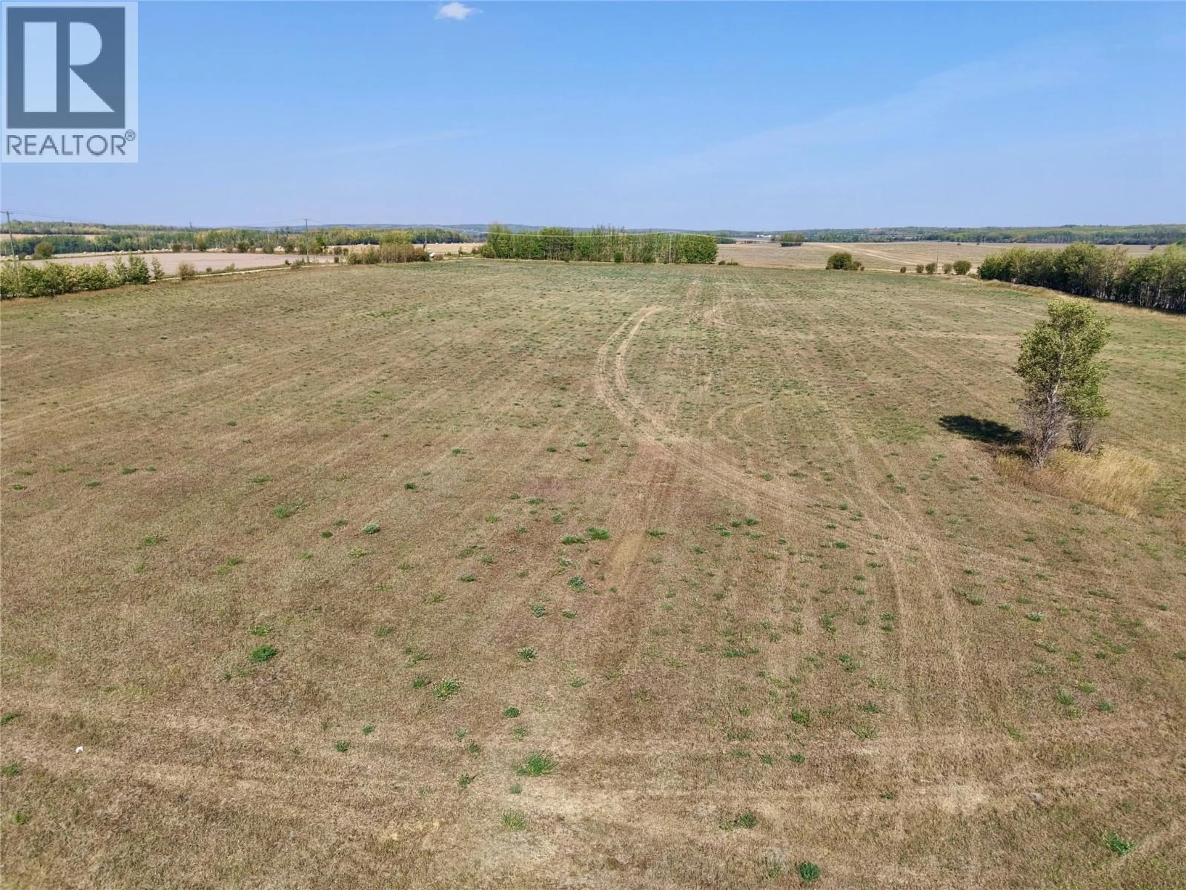A pic from outside/outdoor area/front of a property/back of a property/a pic from drone, building for 15243 209 ROAD, Dawson Creek British Columbia V0C2L0