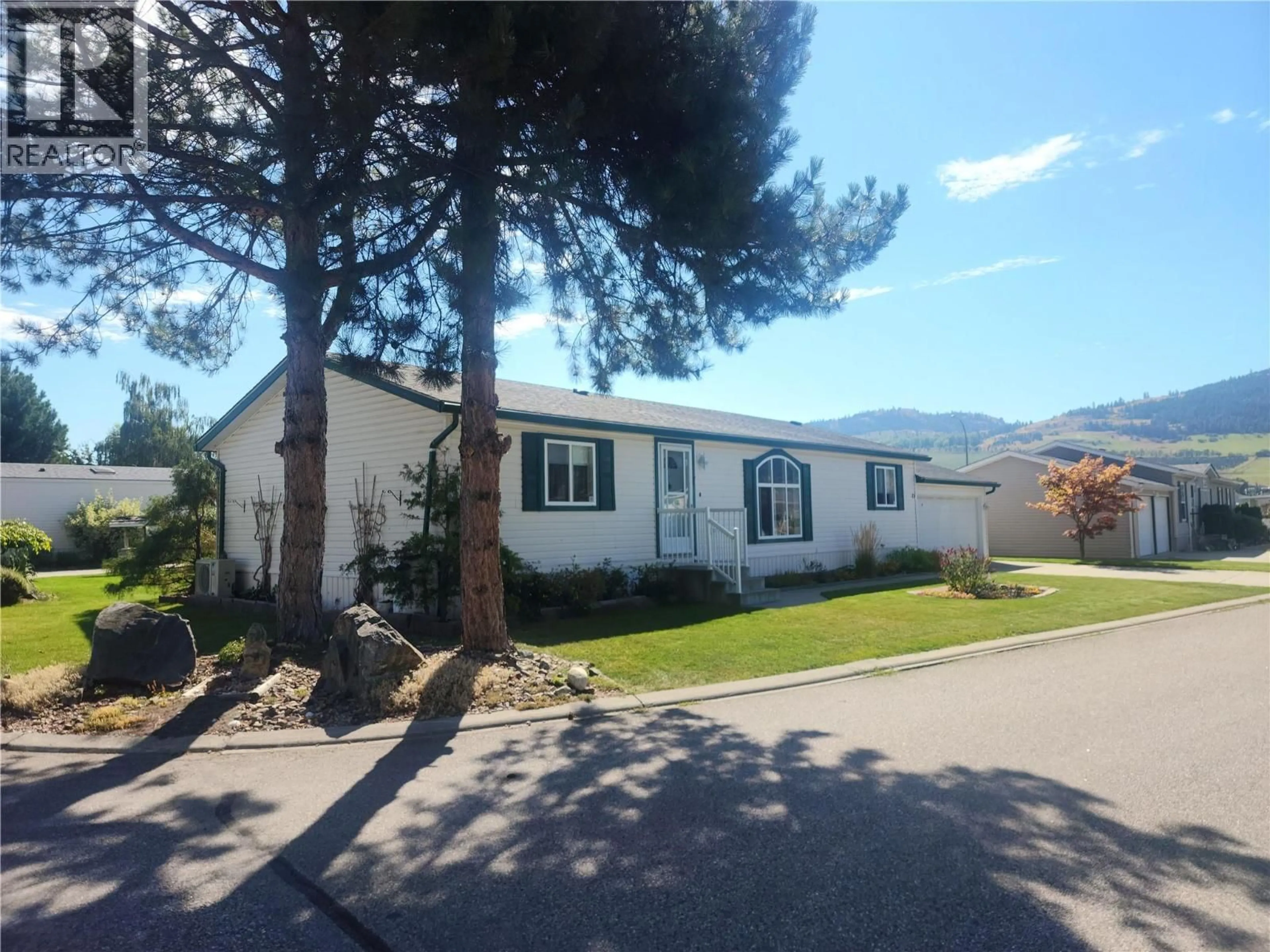 Home with vinyl exterior material, street for 17 - 6688 TRONSON ROAD, Vernon British Columbia V1H1R9