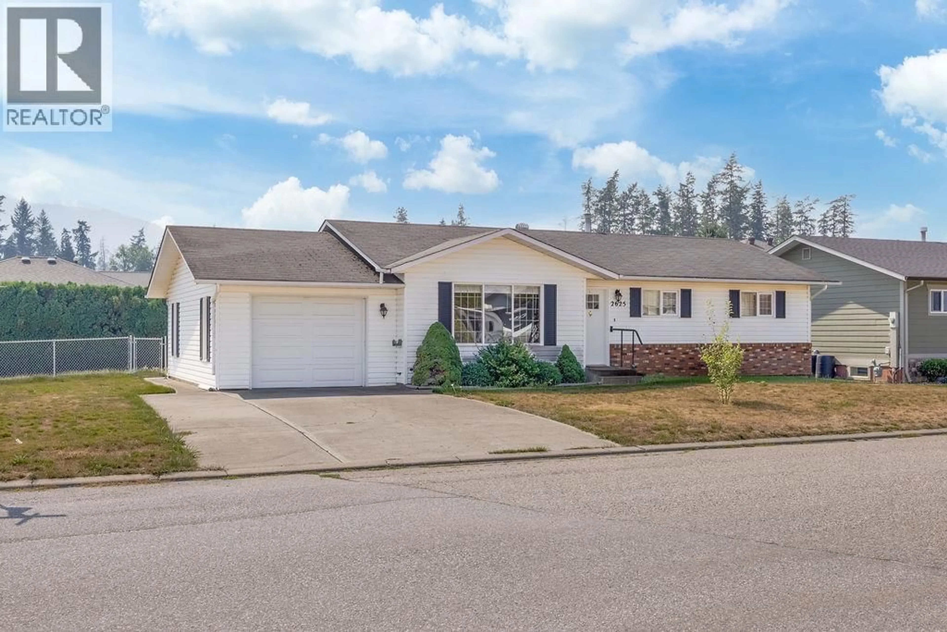 Home with vinyl exterior material, street for 2625 CATHERINE CRESCENT, Armstrong British Columbia V4Y0B3
