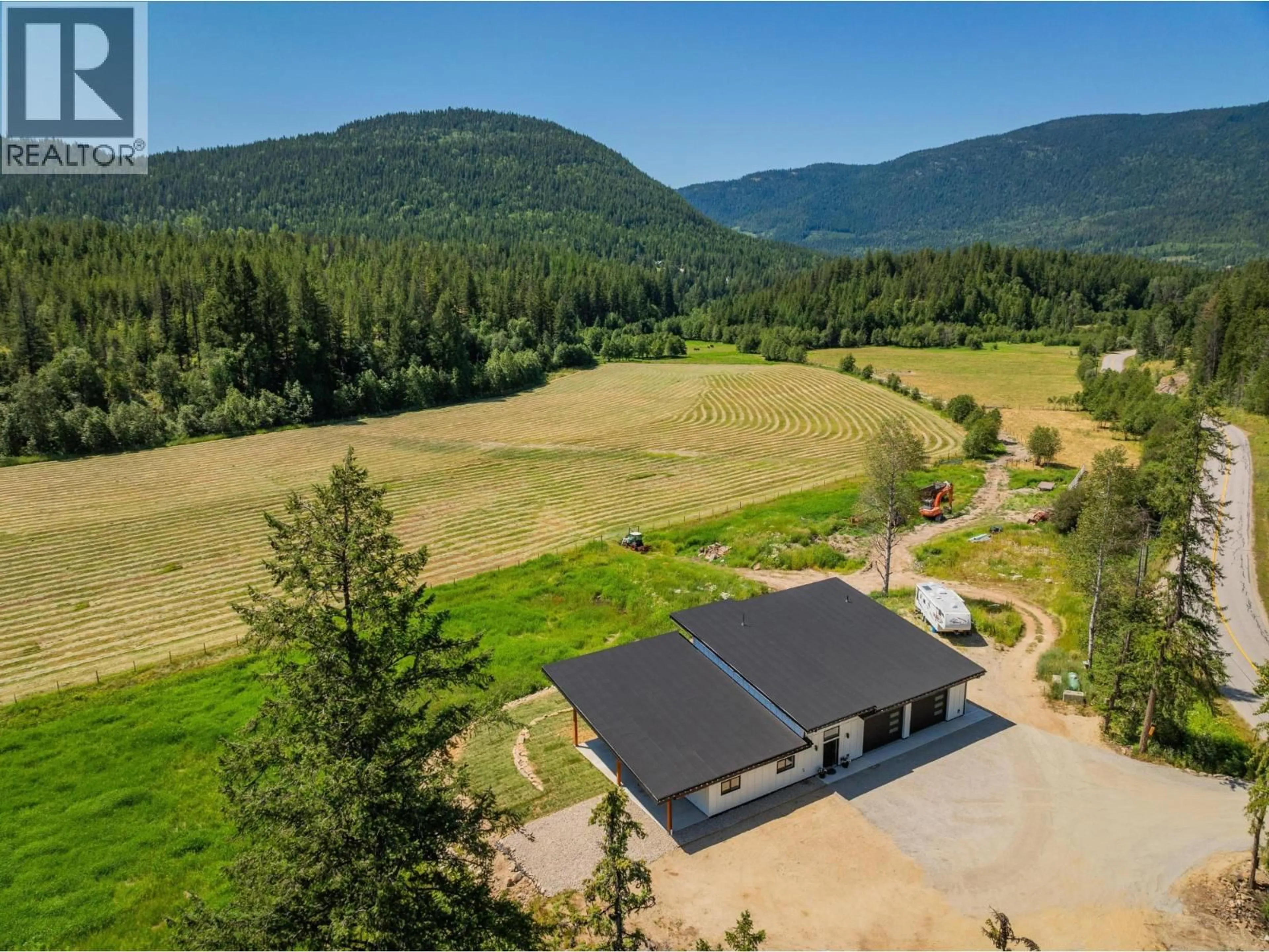A pic from outside/outdoor area/front of a property/back of a property/a pic from drone, mountain view for 2335 PASS CREEK ROAD, Castlegar British Columbia v1n4t4