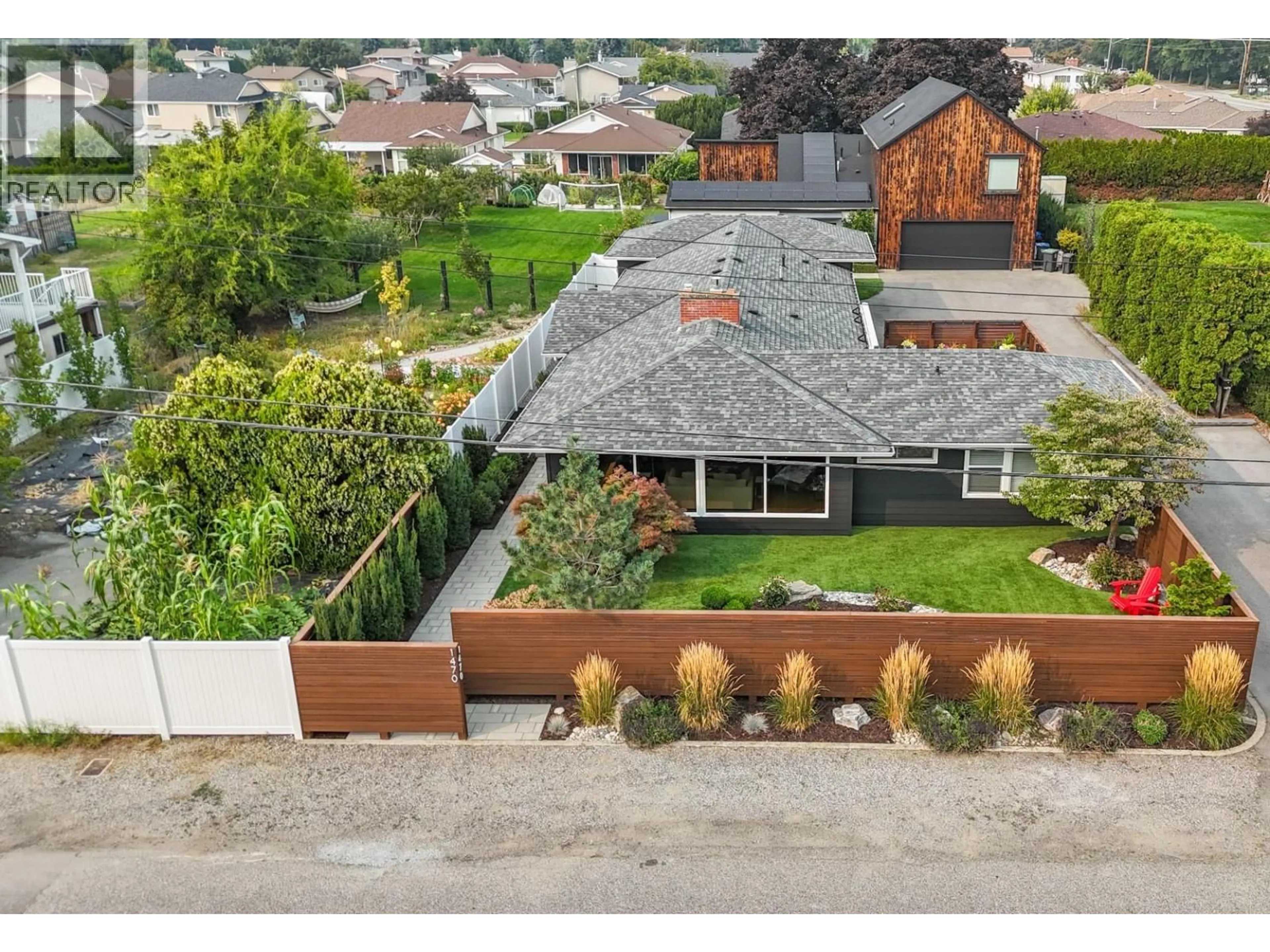 A pic from outside/outdoor area/front of a property/back of a property/a pic from drone, street for 1470 GUISACHAN PLACE, Kelowna British Columbia V1Y7X7