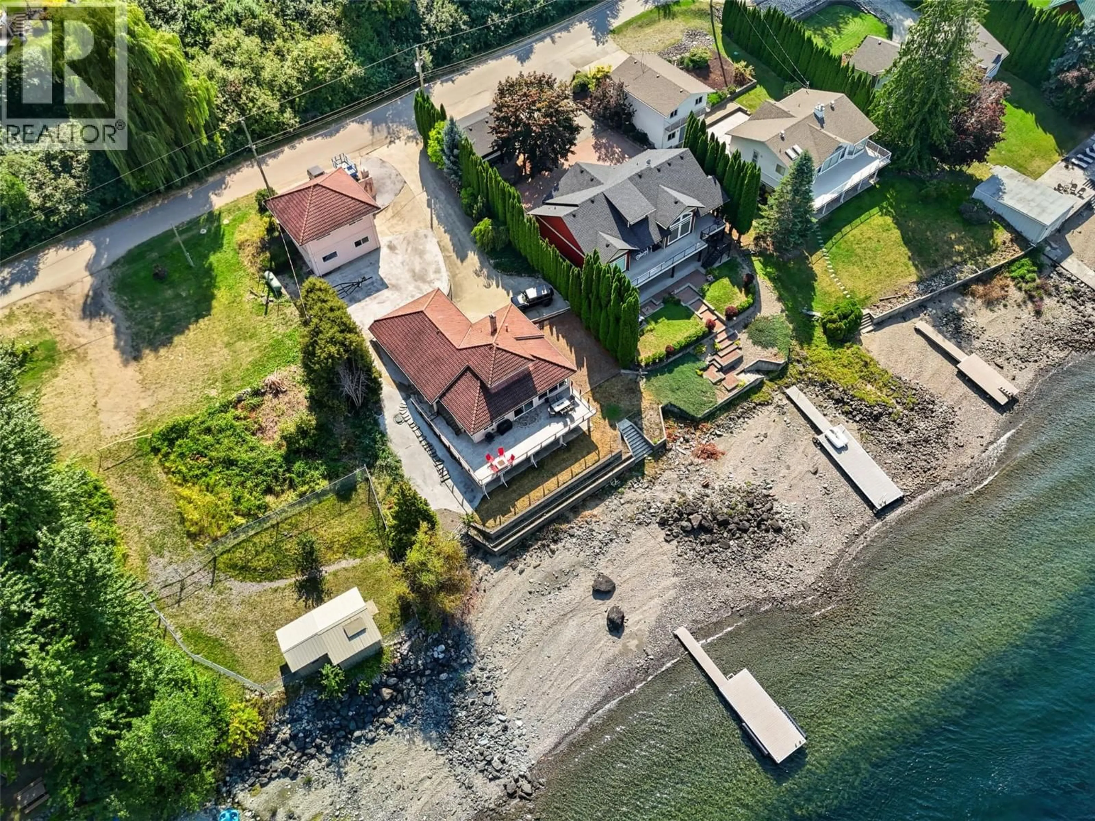 A pic from outside/outdoor area/front of a property/back of a property/a pic from drone, water/lake/river/ocean view for 4071 REID ROAD, South Shuswap British Columbia V0E1T0