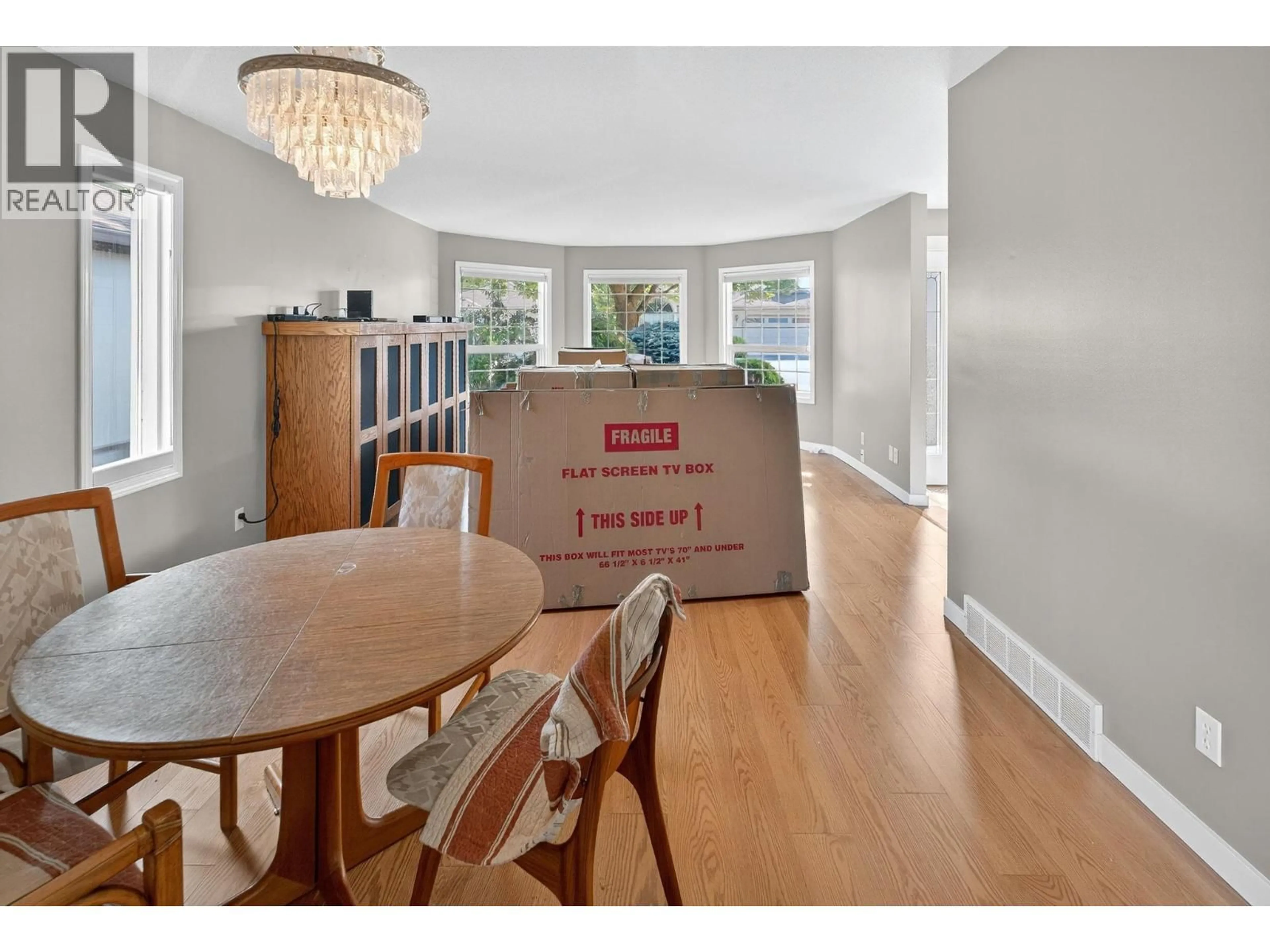 Dining room, wood/laminate floor for 68 - 1201 CAMERON AVENUE, Kelowna British Columbia V1W3R8