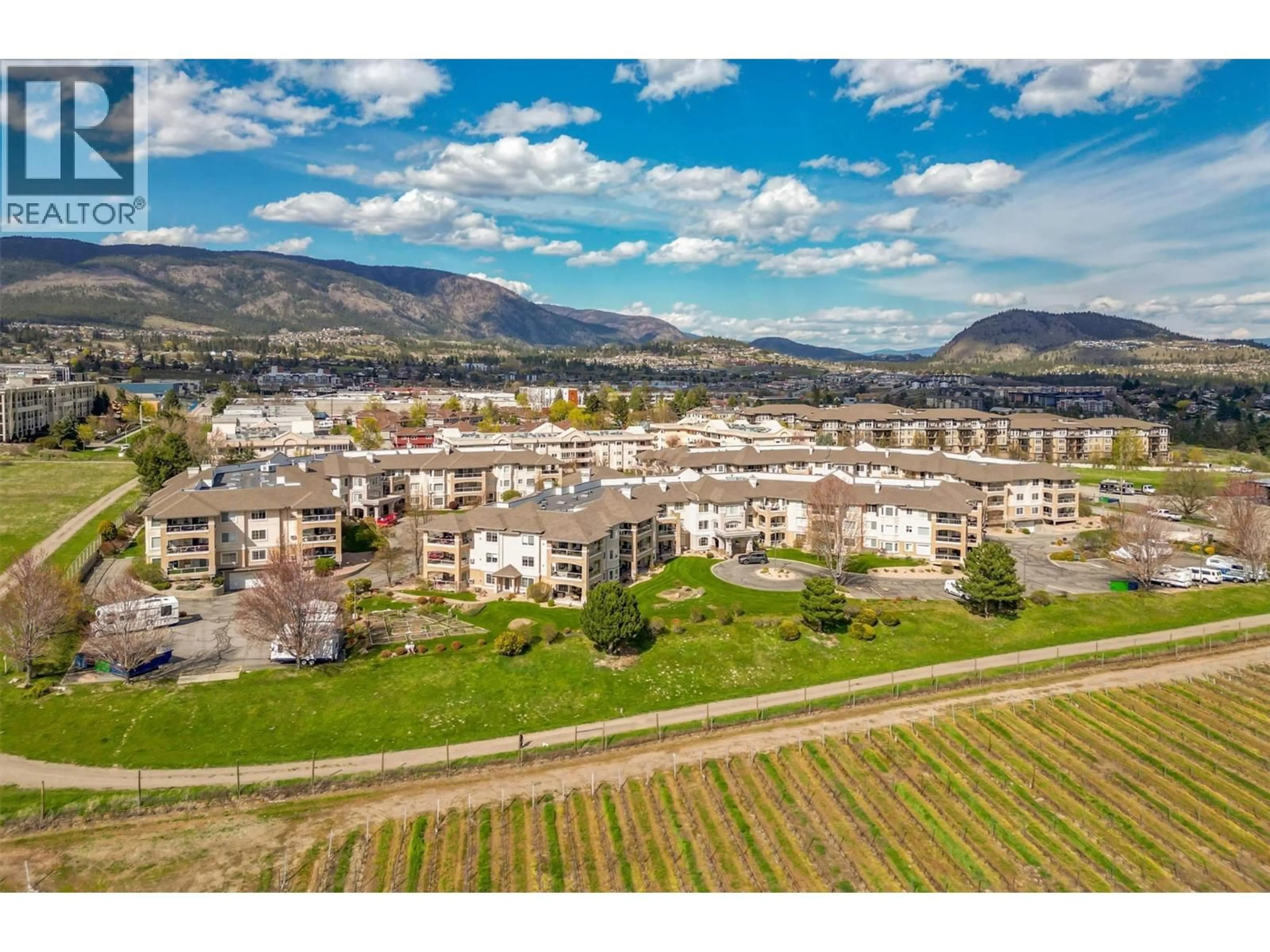 A pic from outside/outdoor area/front of a property/back of a property/a pic from drone, mountain view for 204 - 3890 BROWN ROAD, West Kelowna British Columbia V4T2J5