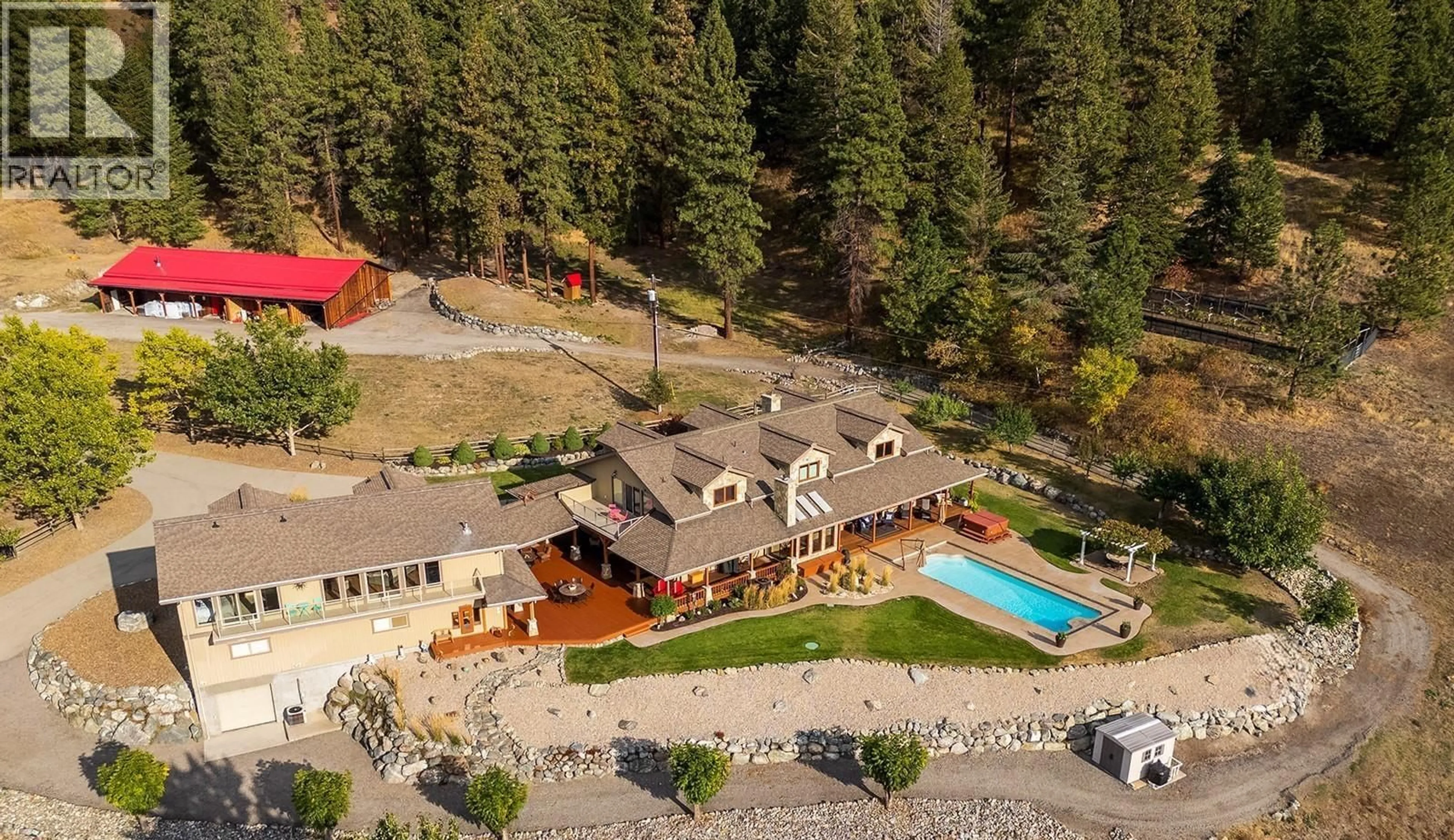 A pic from outside/outdoor area/front of a property/back of a property/a pic from drone, mountain view for 5705 UPPER BOOTH N ROAD, Kelowna British Columbia V1X7V7