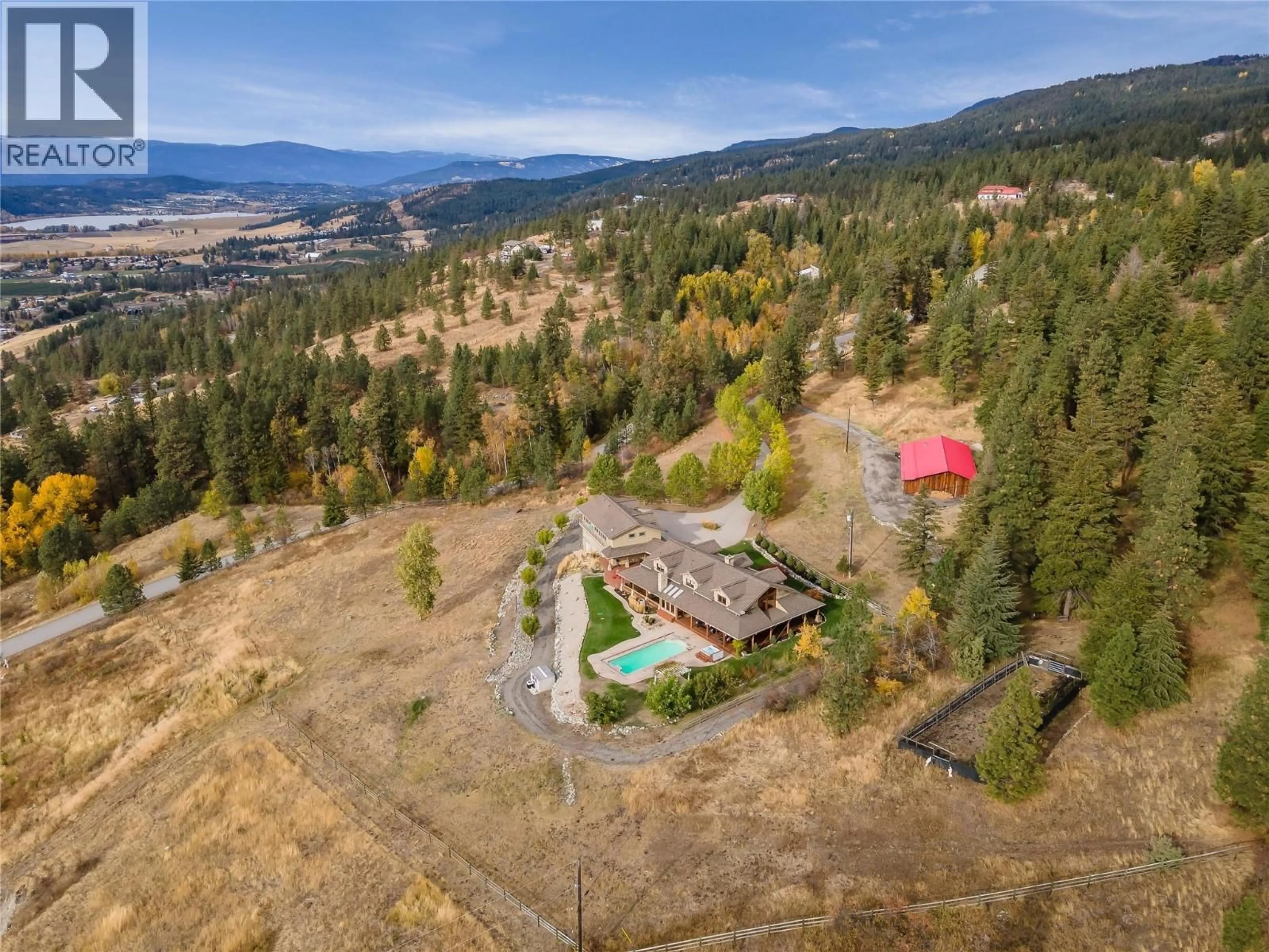 A pic from outside/outdoor area/front of a property/back of a property/a pic from drone, mountain view for 5705 UPPER BOOTH N ROAD, Kelowna British Columbia V1X7V7