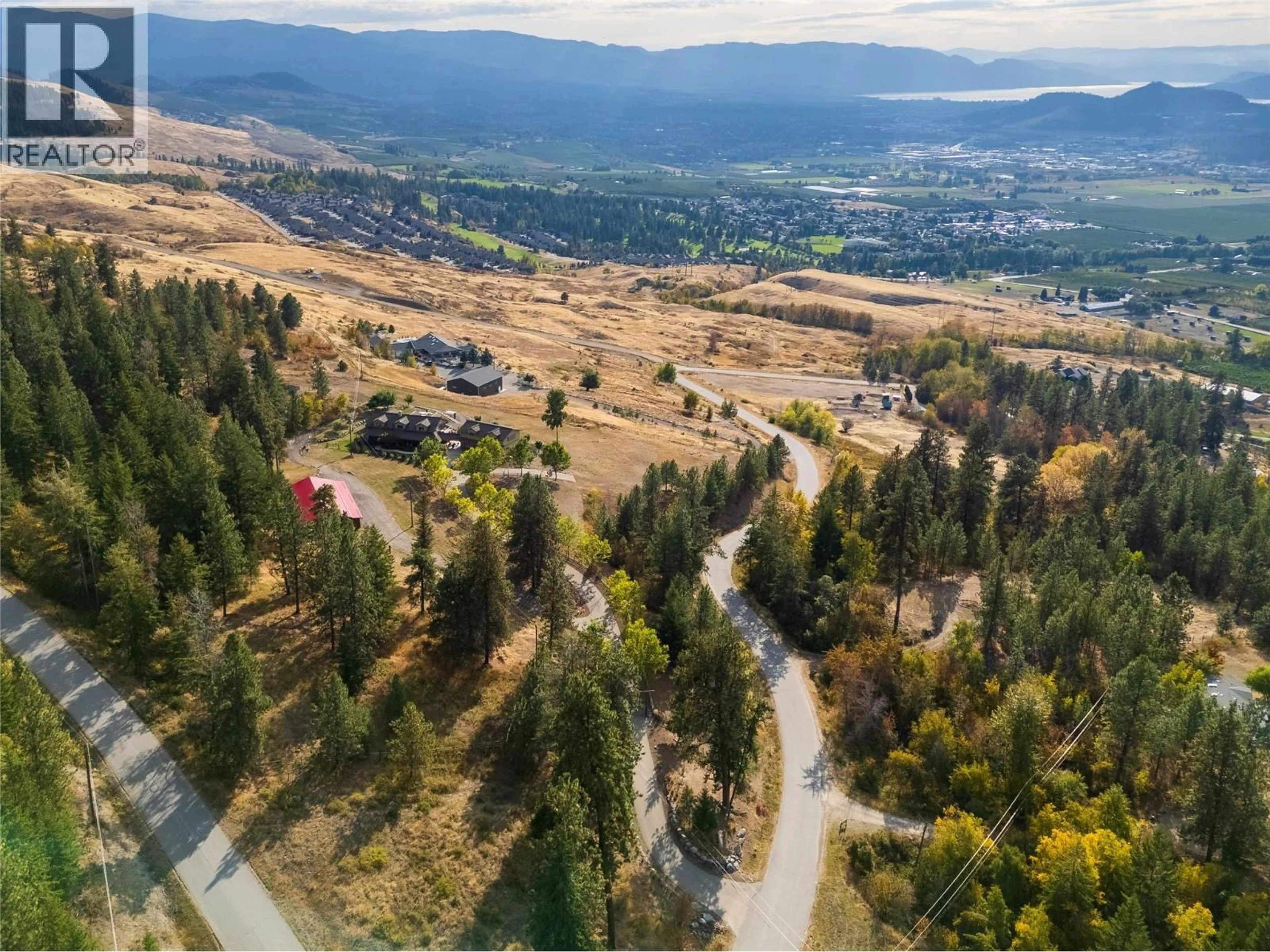 A pic from outside/outdoor area/front of a property/back of a property/a pic from drone, mountain view for 5705 UPPER BOOTH N ROAD, Kelowna British Columbia V1X7V7