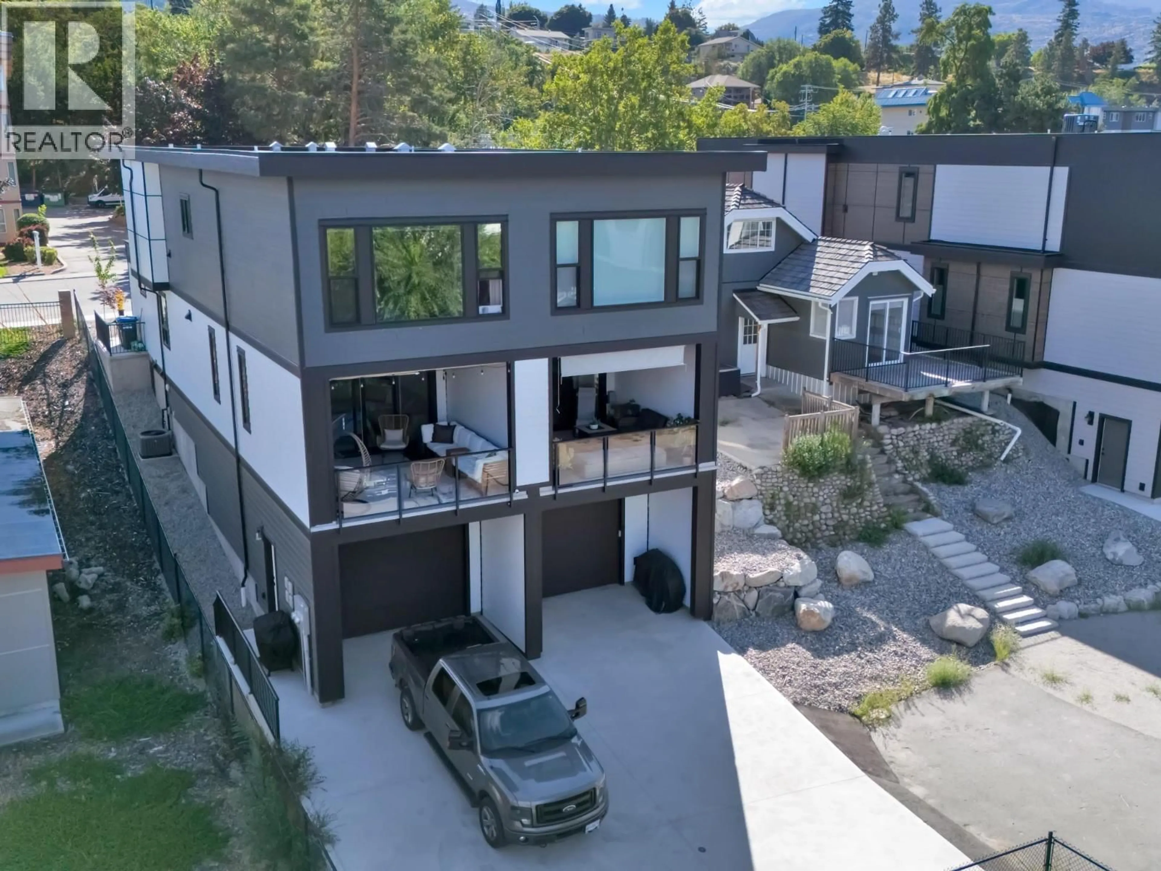 A pic from outside/outdoor area/front of a property/back of a property/a pic from drone, street for 101 - 151 ABBOTT STREET, Penticton British Columbia V2A4J3