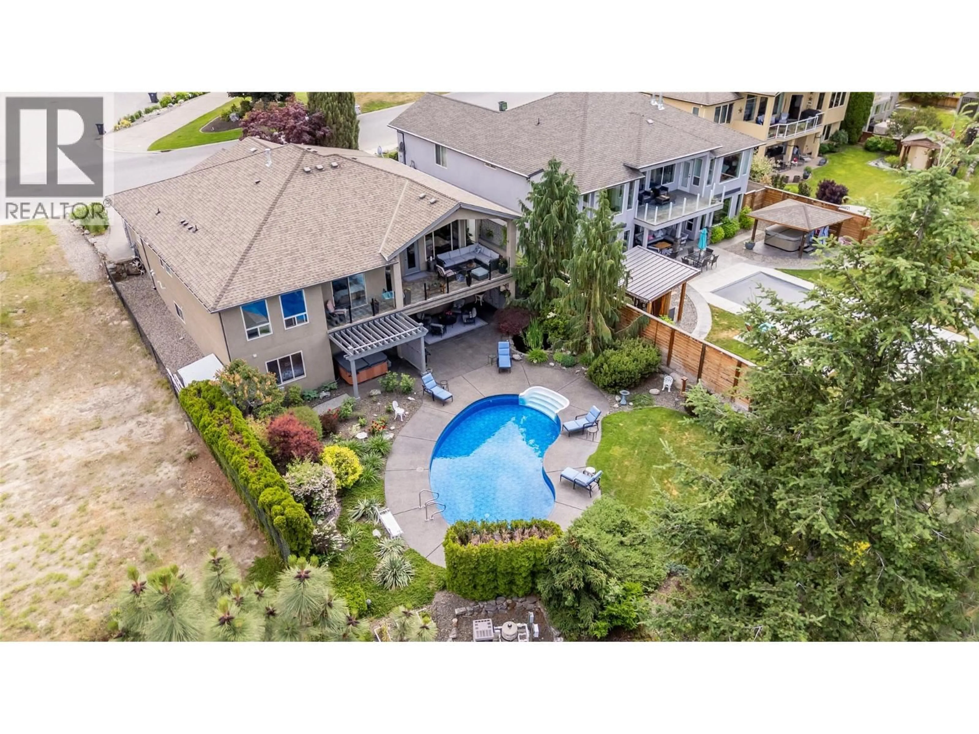A pic from outside/outdoor area/front of a property/back of a property/a pic from drone, water/lake/river/ocean view for 1036 ARBOR VIEW DRIVE, Kelowna British Columbia V1W5A1
