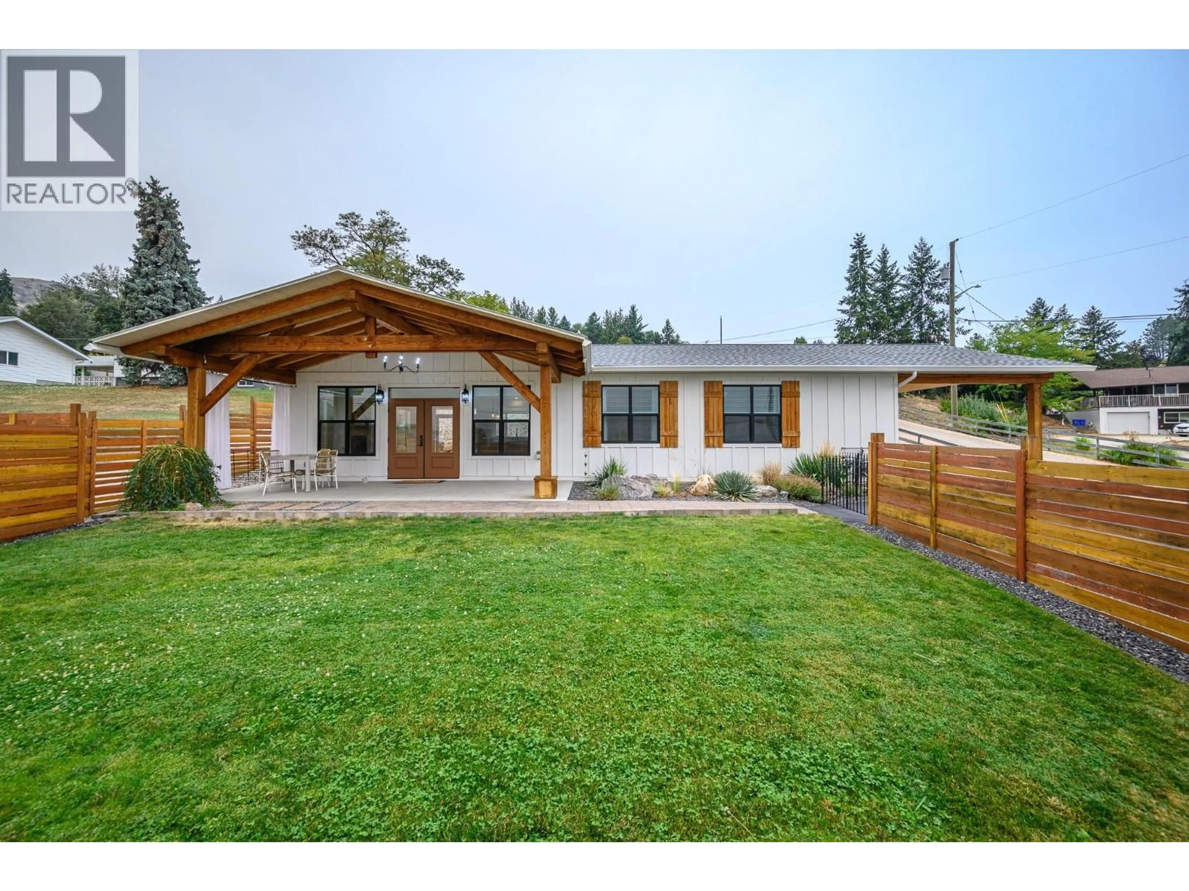 Home with vinyl exterior material, mountain view for 6448 AGASSIZ ROAD, Vernon British Columbia V1H1P9