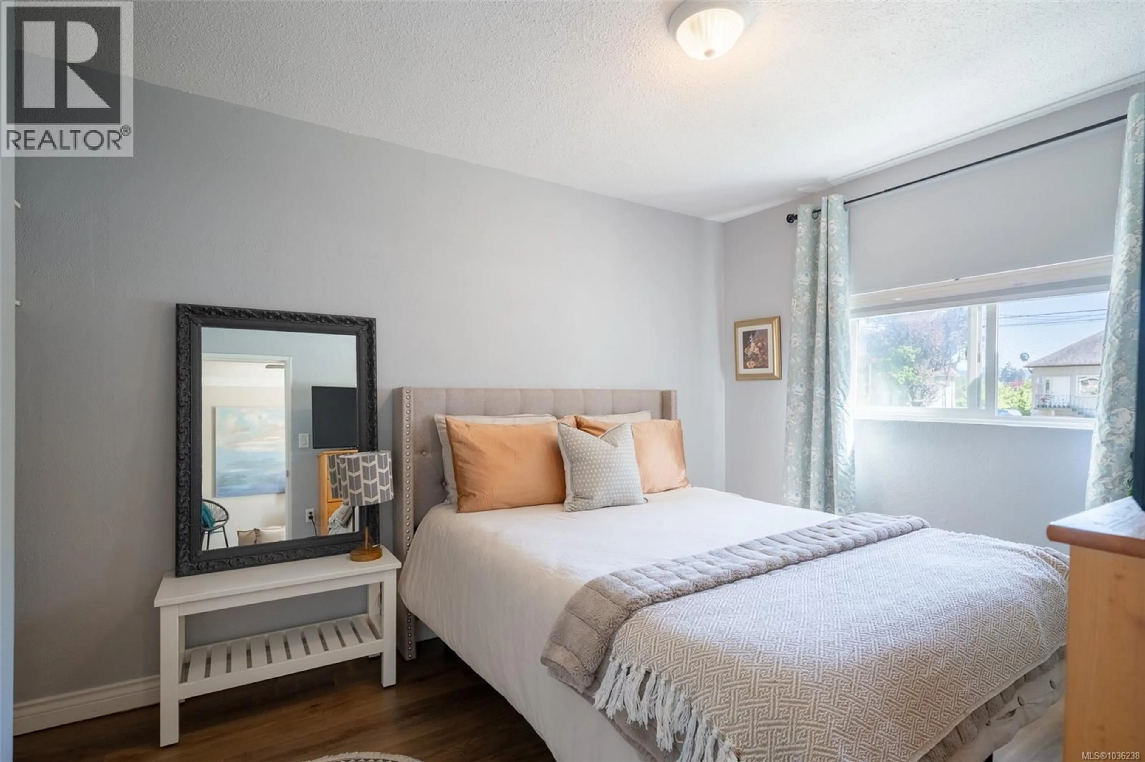 Bedroom with bed, wood/laminate floor for 4565 LATHOM ROAD, Port Alberni British Columbia V9Y5S8