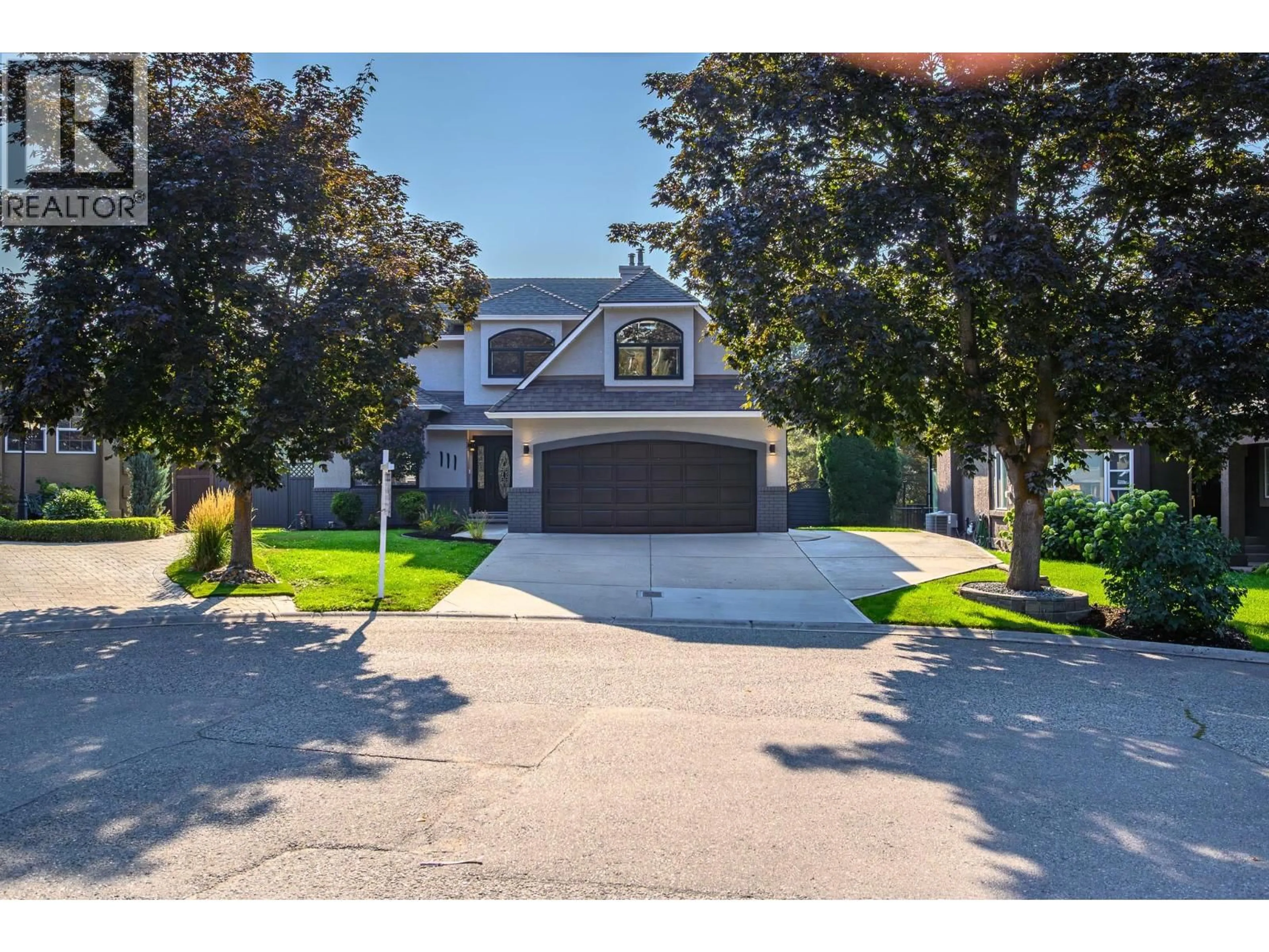 Home with vinyl exterior material, street for 111 PORTSIDE COURT, Kelowna British Columbia V1V1T2