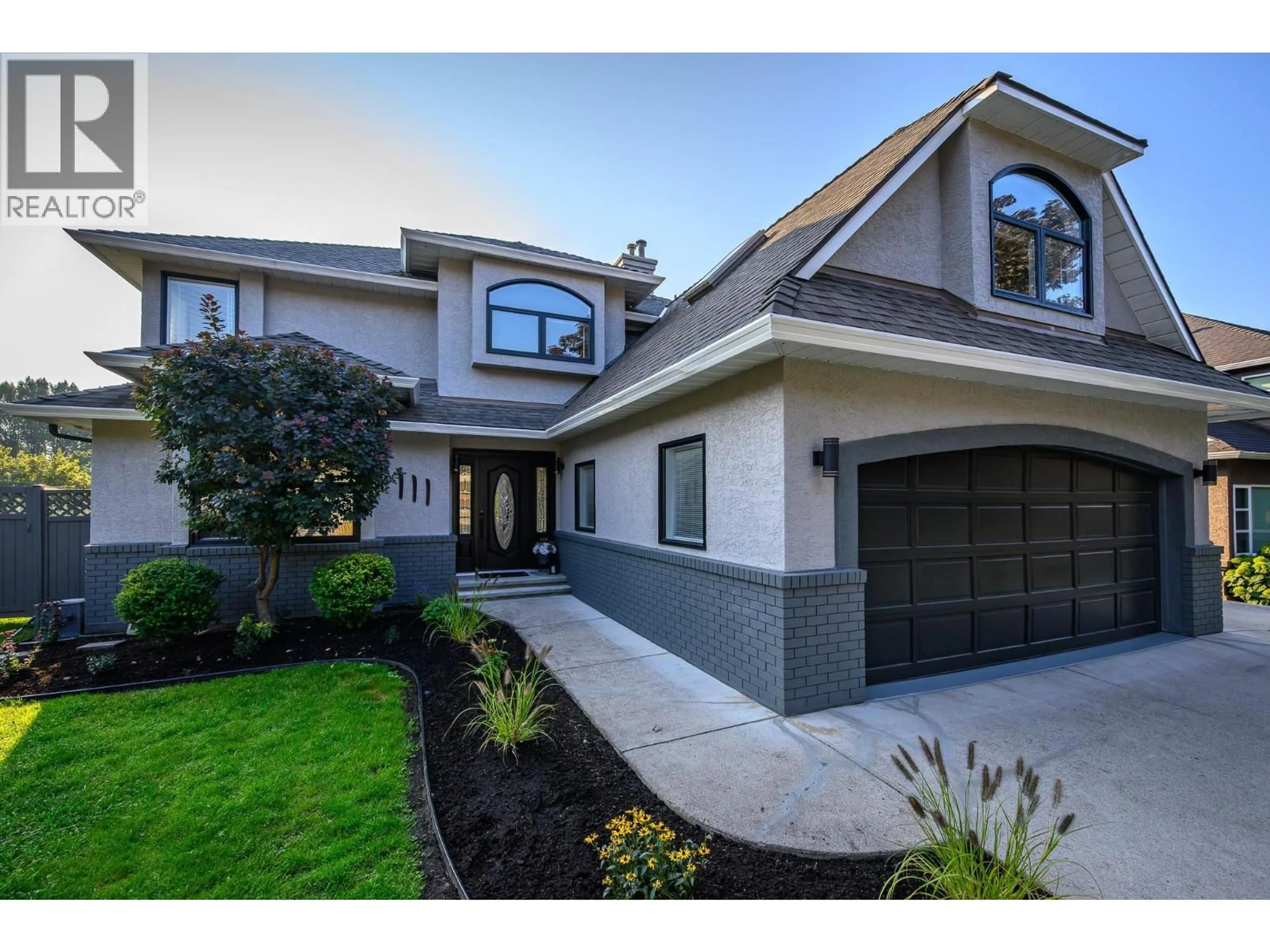 Home with brick exterior material, street for 111 PORTSIDE COURT, Kelowna British Columbia V1V1T2