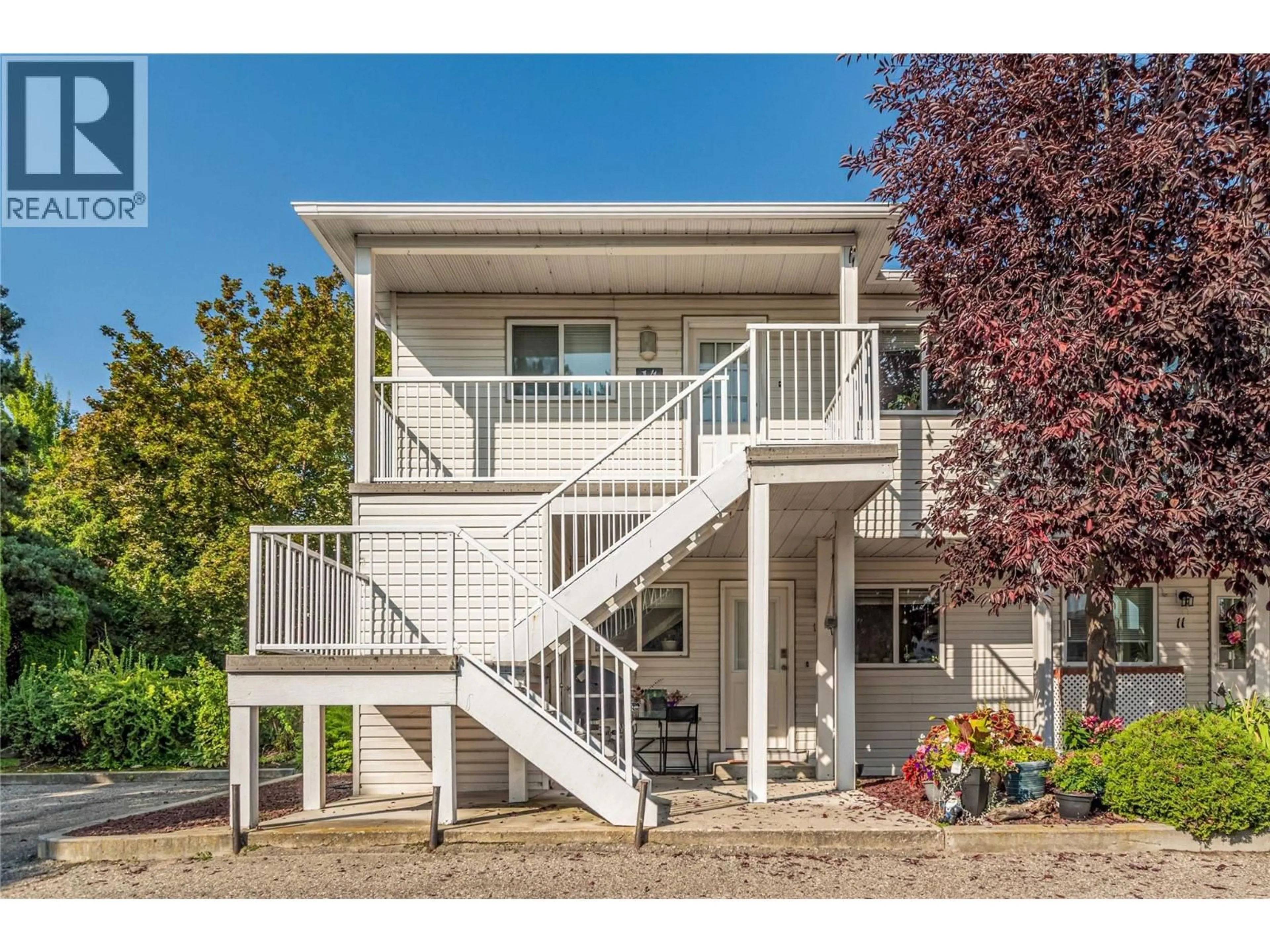 Home with vinyl exterior material, street for 14 - 751 LANFRANCO ROAD, Kelowna British Columbia V1W3B9