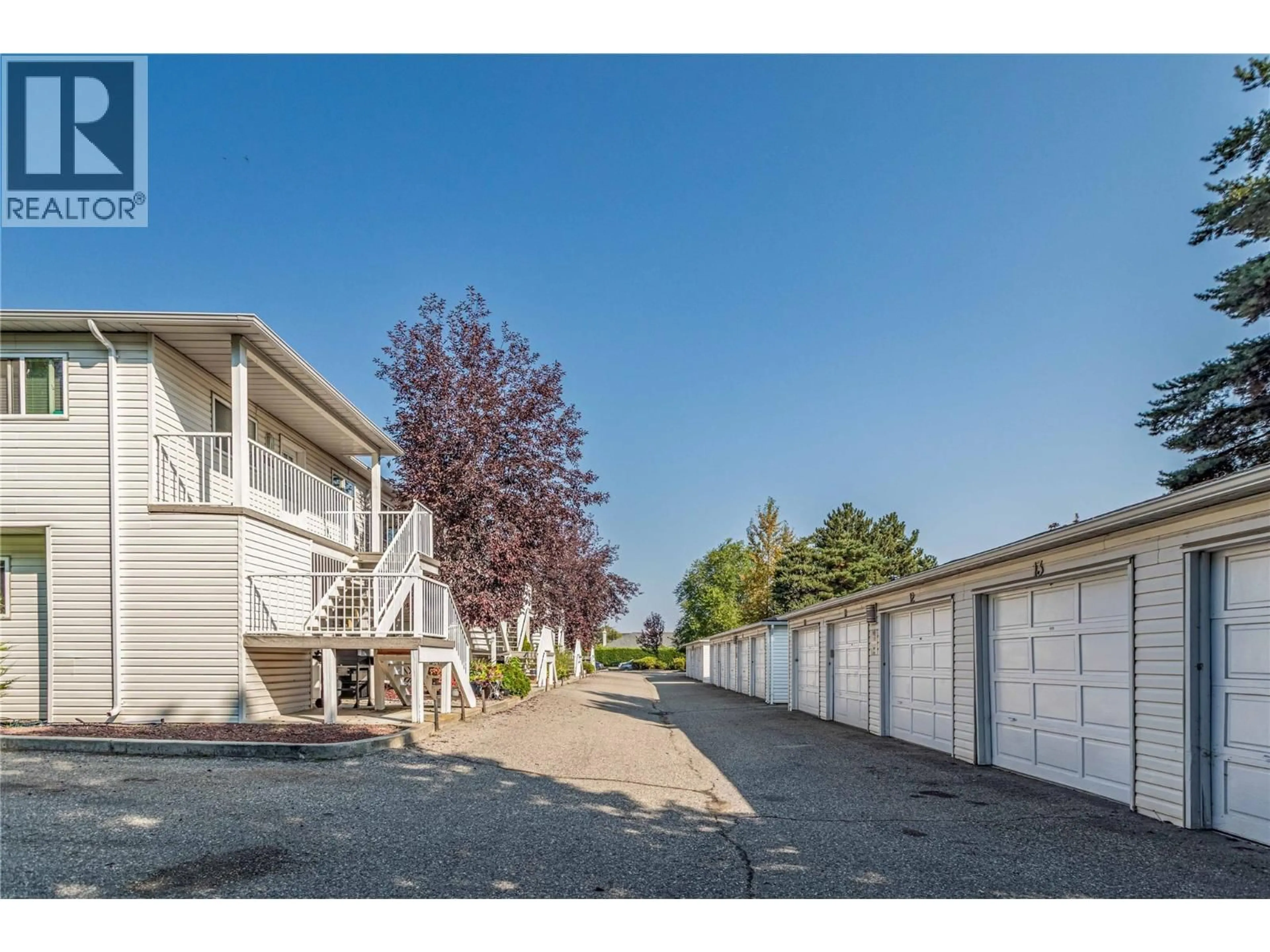 A pic from outside/outdoor area/front of a property/back of a property/a pic from drone, street for 14 - 751 LANFRANCO ROAD, Kelowna British Columbia V1W3B9