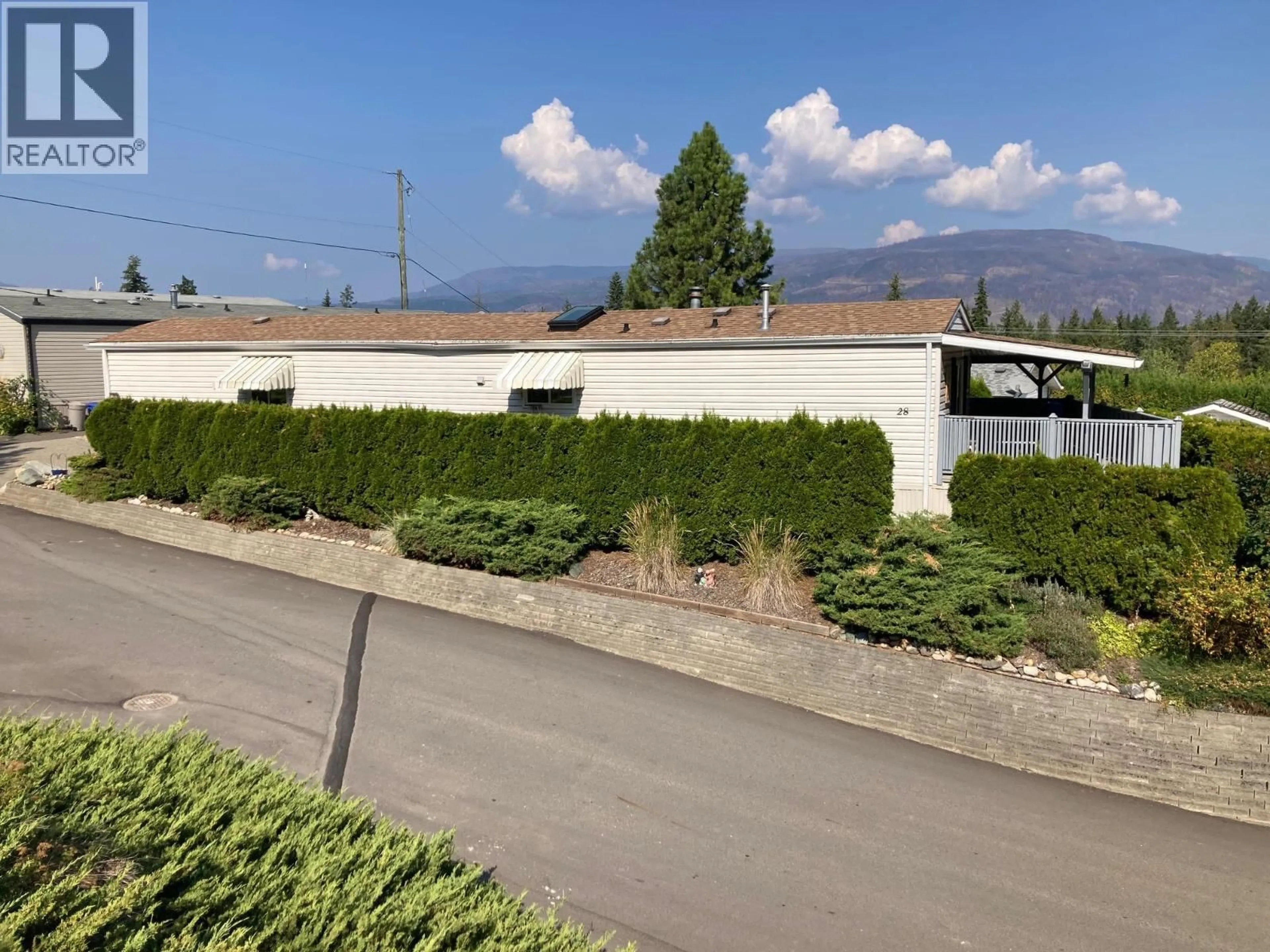 A pic from outside/outdoor area/front of a property/back of a property/a pic from drone, mountain view for 28 - 1420 TRANS CANADA HIGHWAY, Sorrento British Columbia V0E2W2