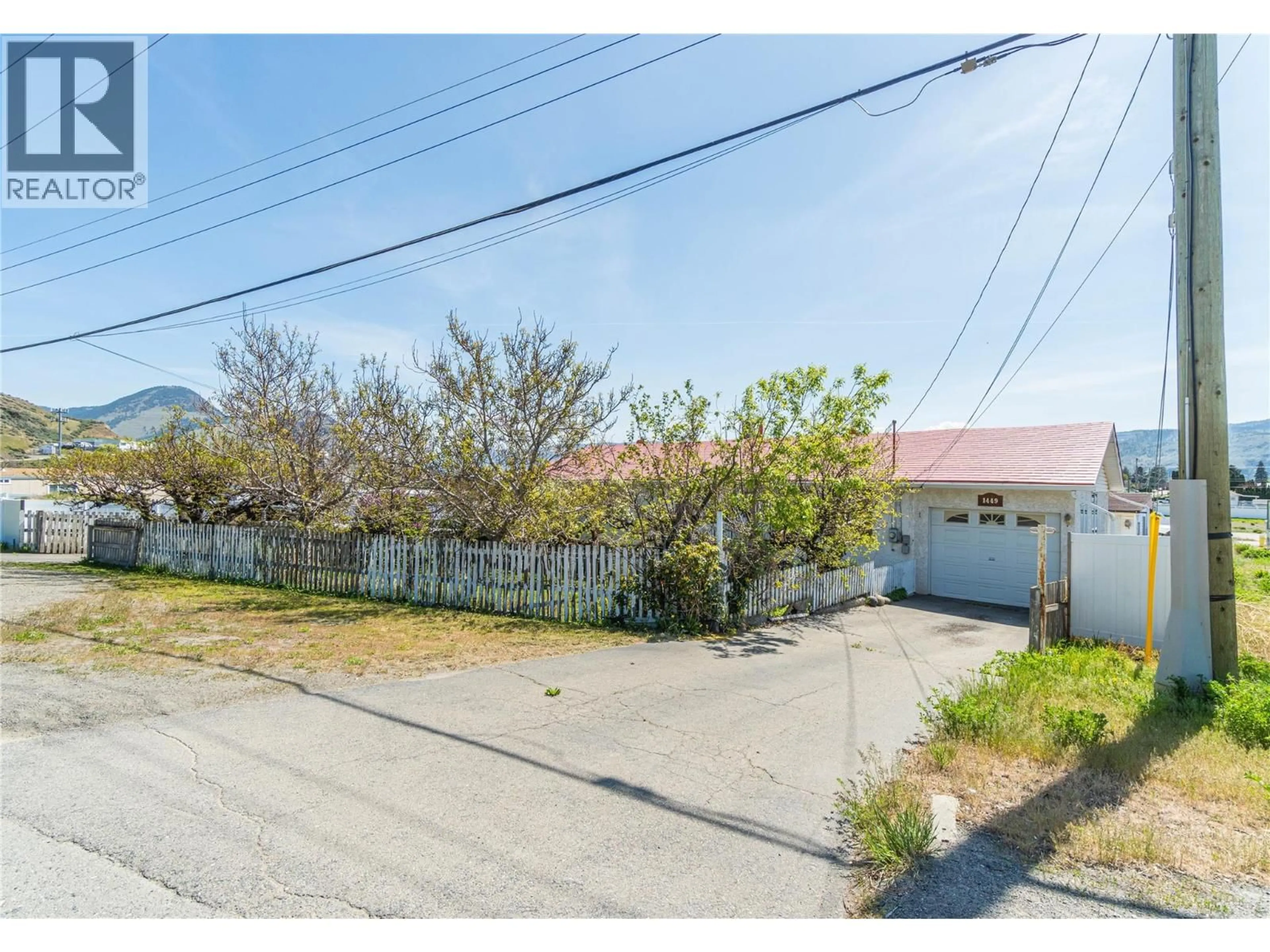 A pic from outside/outdoor area/front of a property/back of a property/a pic from drone, street for 1449 ORD ROAD, Kamloops British Columbia V2B7V2