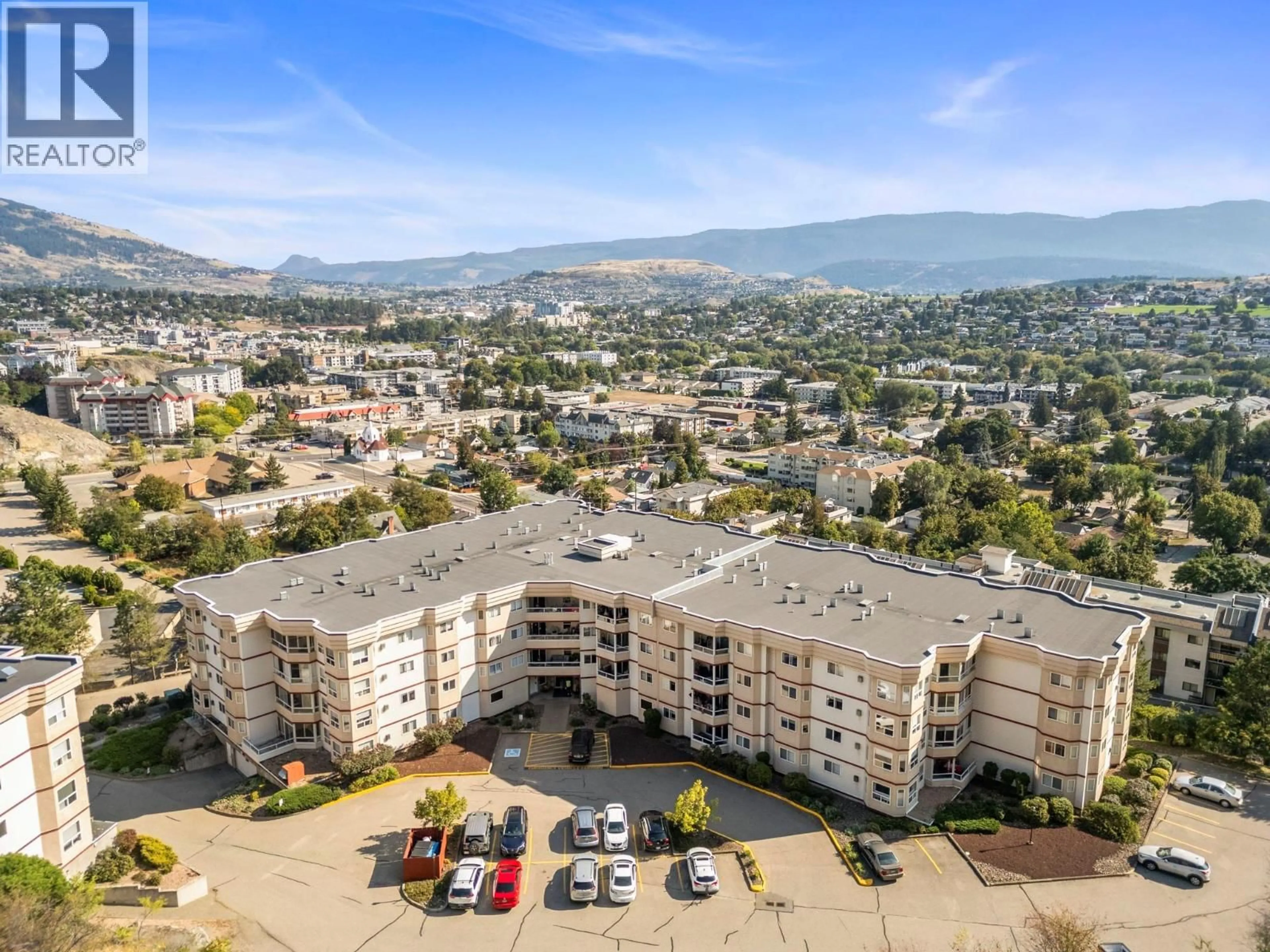 A pic from outside/outdoor area/front of a property/back of a property/a pic from drone, mountain view for 202 - 3806 35 AVENUE, Vernon British Columbia V1T9N6